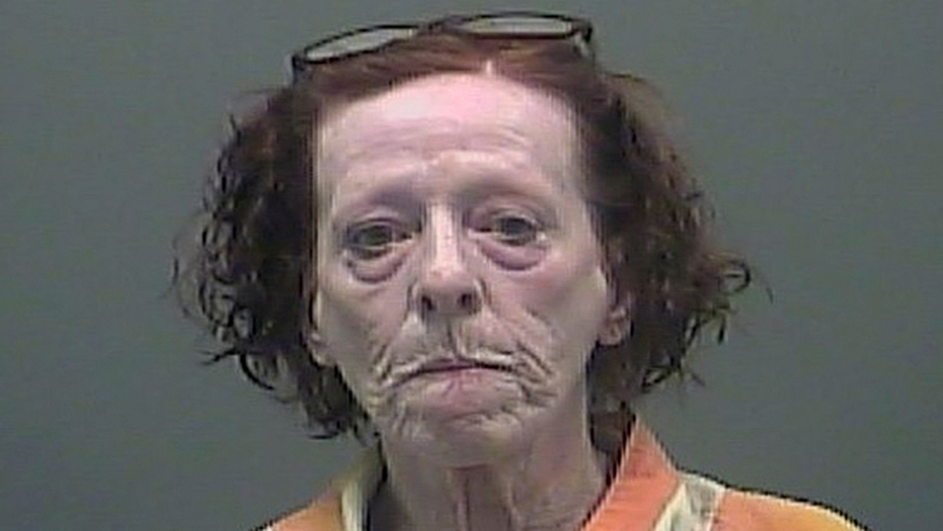 An Alabama woman was arrested after setting a ham on fire at a motel where she was living.