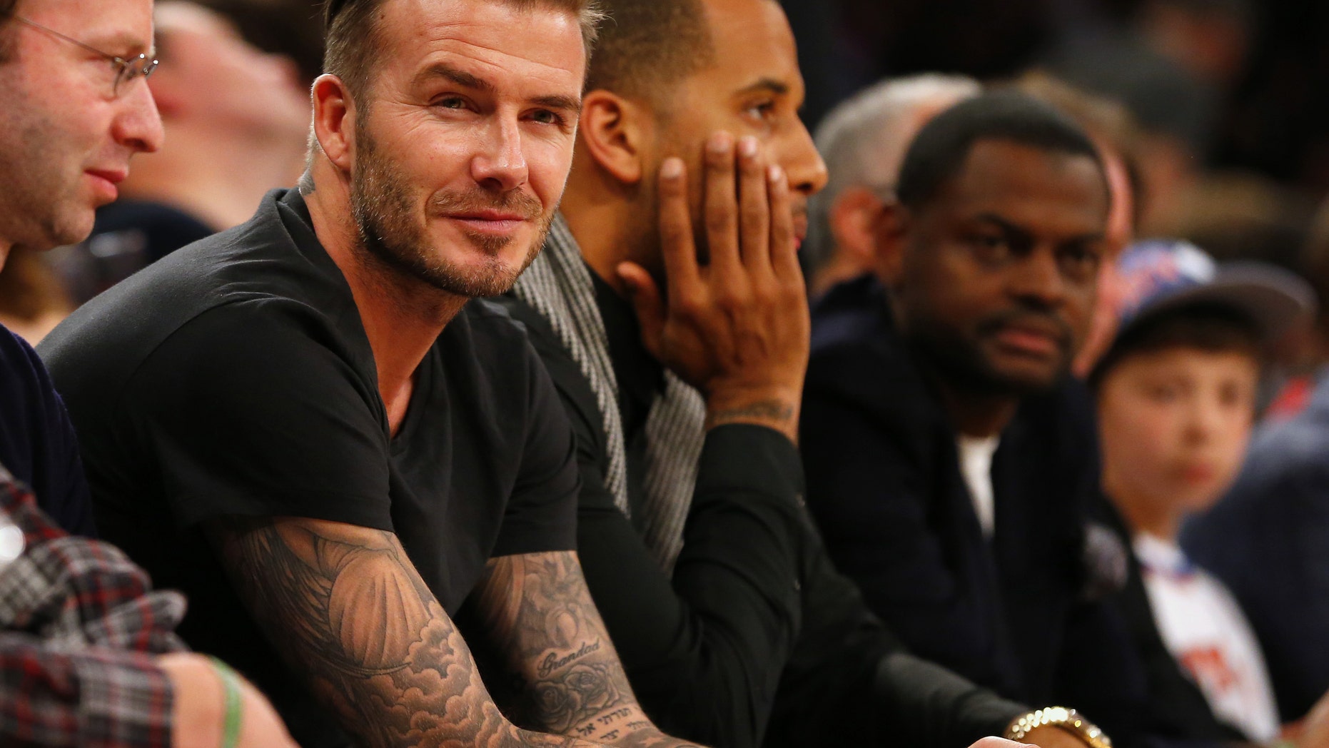 NEW YORK, NY - FEBRUARY 1: Former soccer player David Beckham watches the action during a game between the Miami Heat and the New York Knicks at Madison Square Garden on February. 1, 2014 in New York City. The Heat defeated the Knicks 106-91. NOTE TO USER: User expressly acknowledges and agrees that, by downloading and/or using this Photograph, user is consenting to the terms and conditions of the Getty Images License Agreement. (Photo by Rich Schultz /Getty Images)