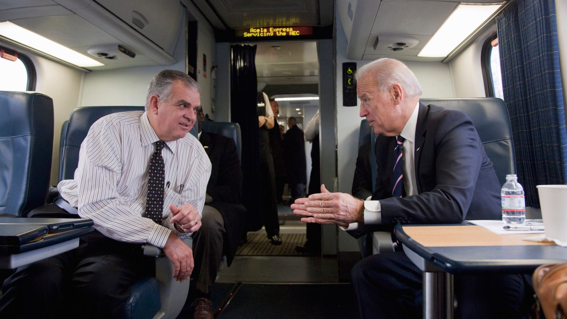 Feb. 8: Joe Biden, talks with Transportation Secretary Ray LaHood on a train heading to Philadelphia.