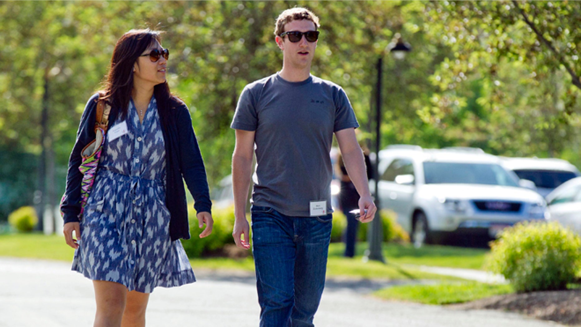 July 9, 2011: Mark Zuckerberg, president and CEO of Facebook, walks with Priscilla Chan during the 2011 Allen and Co. Sun Valley Conference, in Sun Valley, Idaho.