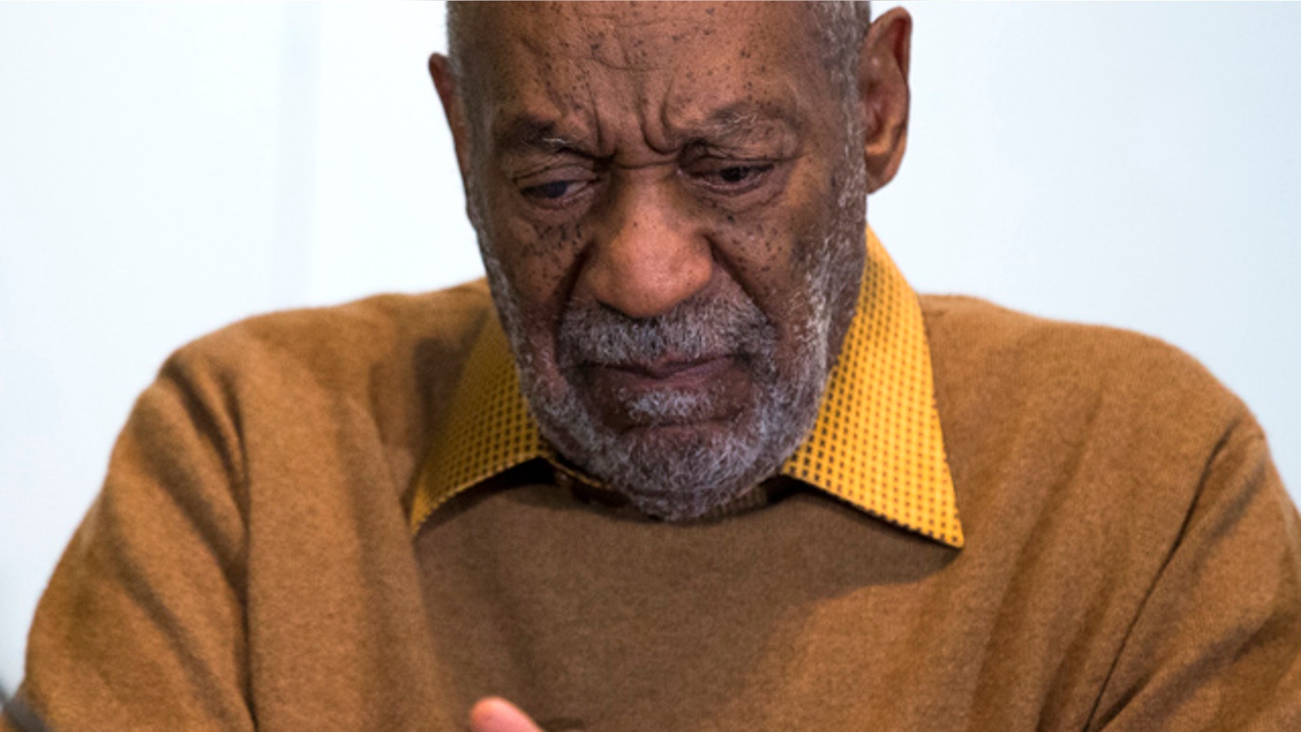 FILE - In this Nov. 6, 2014 file photo, entertainer Bill Cosby pauses during a news conference. (AP Photo/Evan Vucci, File)