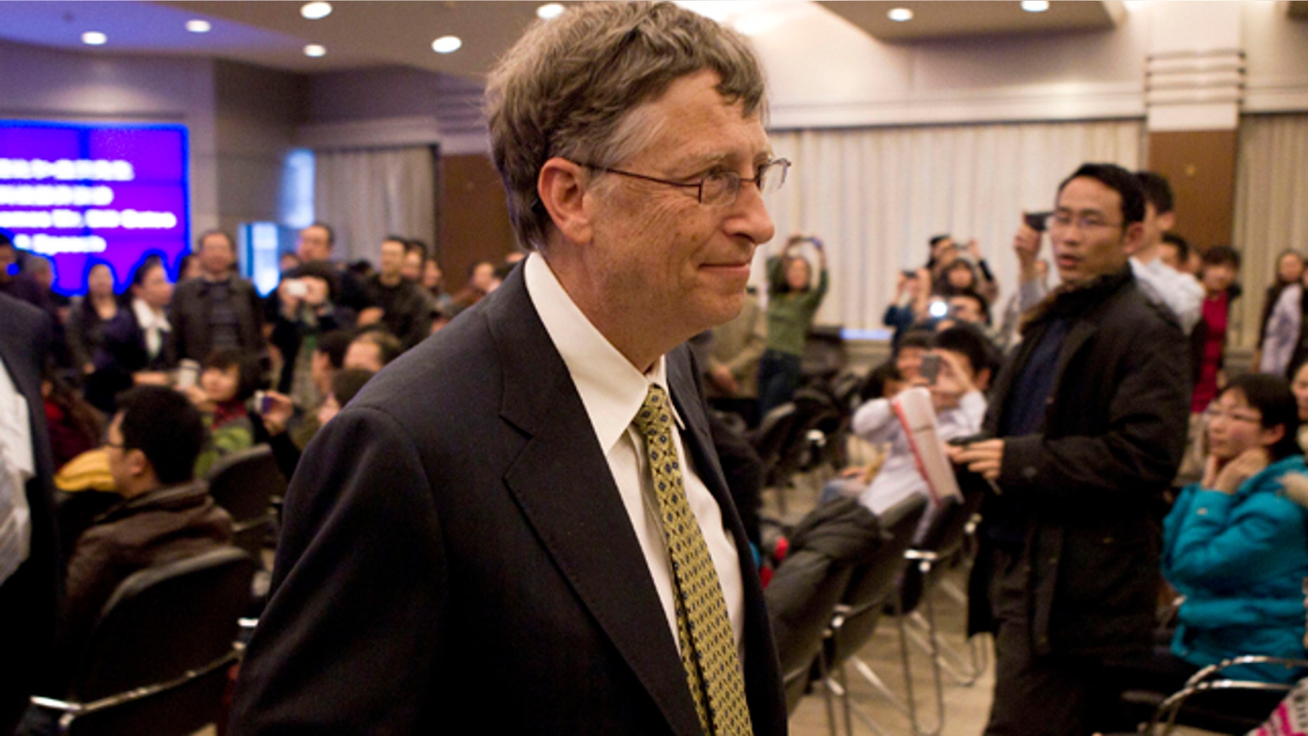 Dec. 7, 2011: Microsoft Corp. co-founder Bill Gates leaves after he delivered a speech at the Ministry of Science and Technology in Beijing. Gates confirmed Wednesday he is in discussions with China to jointly develop a new kind of nuclear reactor.