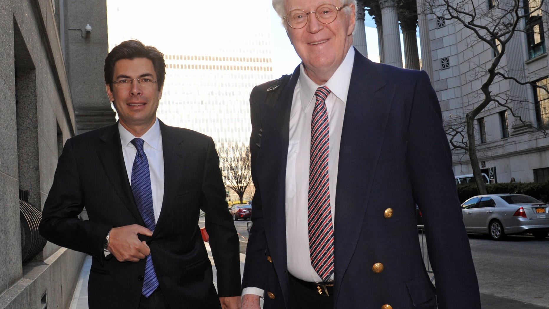 March 27, 2013: Florida energy magnate William Koch, right, arrives at Manhattan federal court in New York.