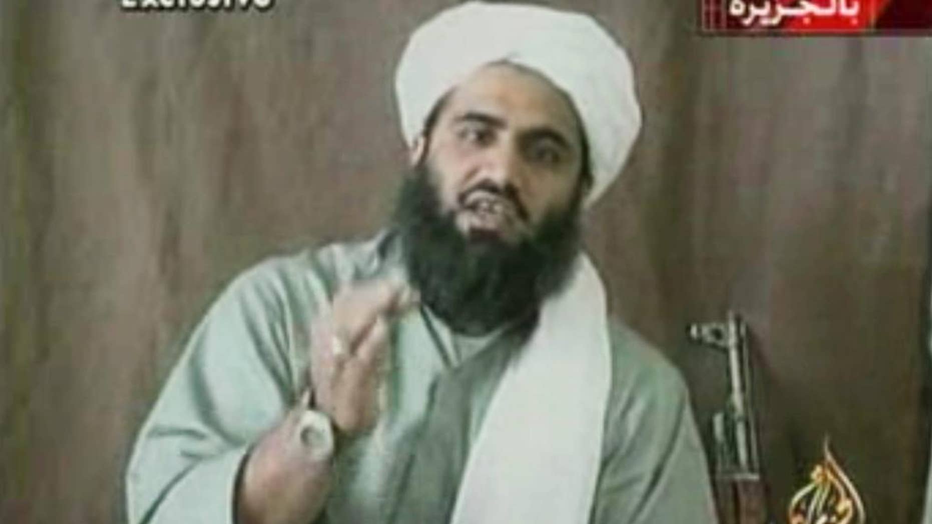 FILE - This image made from video provided by by Al-Jazeera shows Sulaiman Abu Ghaith, Osama bin Laden's son-in-law and spokesman. Abu Ghaith goes to trial Monday, March 3, 2014 in New York on charges that he conspired to kill Americans in his role as al-Qaida's mouthpiece after the Sept. 11 terrorist attacks. He is the highest-ranking al-Qaida figure to stand trial on U.S. soil since the attacks. (AP Photo/Al-Jazeera, File)