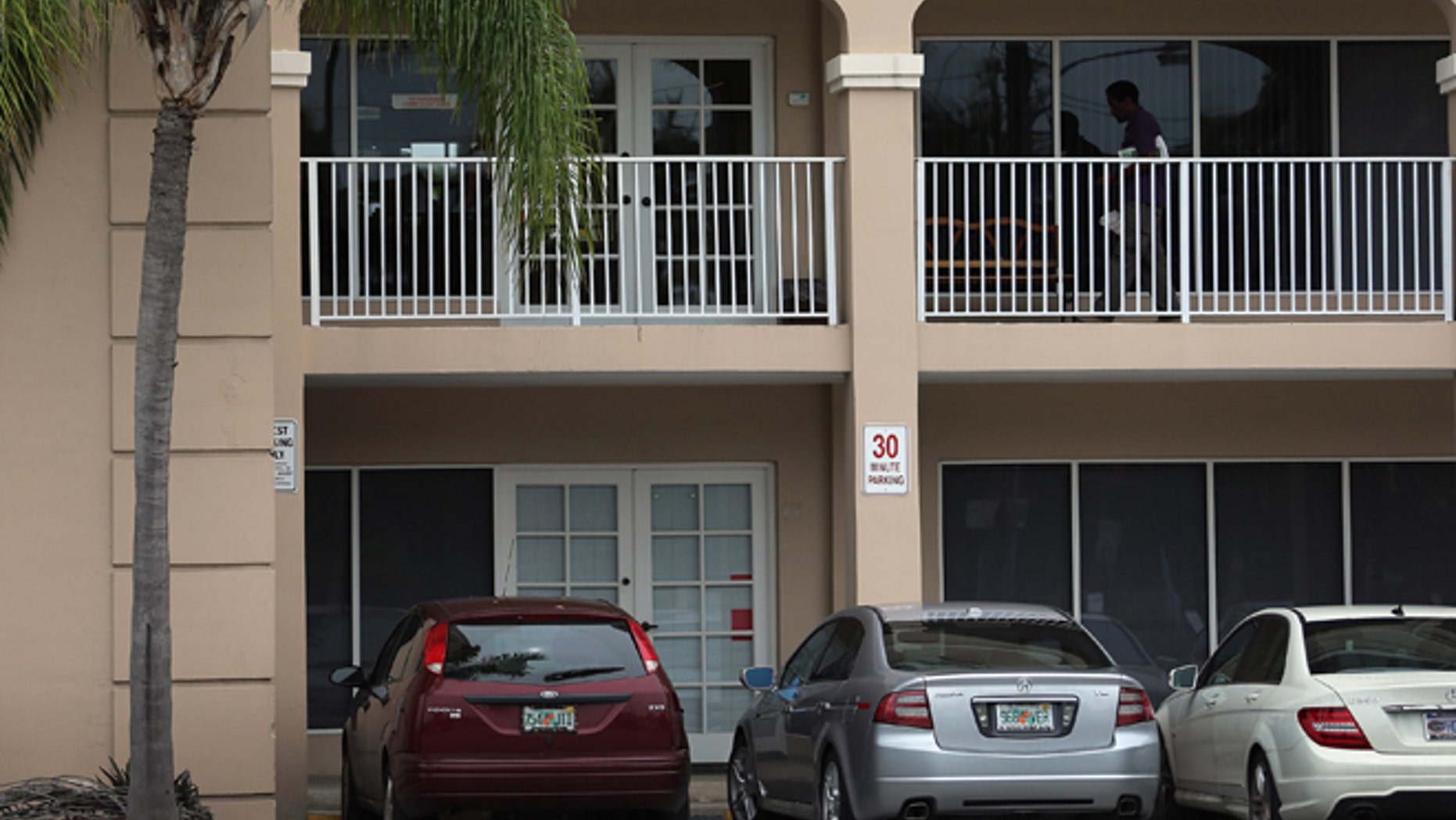CORAL GABLES, FL - JUNE 05: The office where Biogenesis of America, the anti-aging company of Anthony Bosch, who is alleged to have provided HGH and banned testosterone creams to Alex Rodriguez of the New York Yankees and other athletes, was located is seen on the first floor (L) June 5, 2013 in Coral Gables, Florida. Major League Baseball announced today the possible suspension of the baseball players that used the drugs banned under MLB's drug program. (Photo by Joe Raedle/Getty Images)
