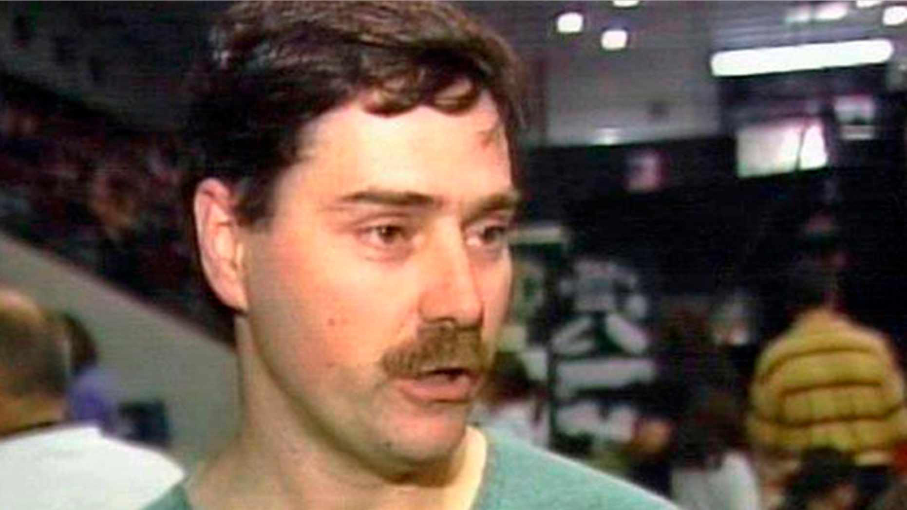 This undated file image from television video shows John P. Tomkins, a letter carrier of Dubuque, Iowa. On May 21, 2013, a federal judge in Chicago sentenced Tomkins to 37 years in prison for sending dud pipe bombs with threatening letters signed "The Bishop."