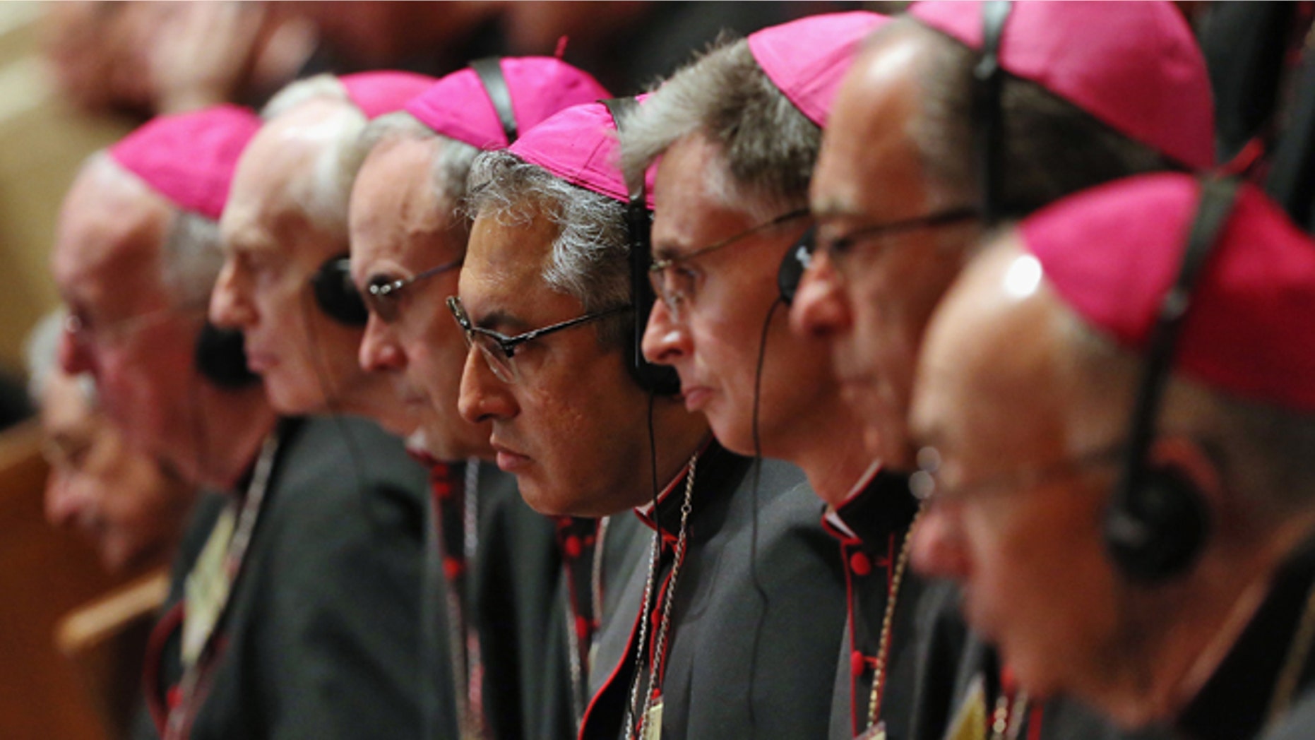 Bishops listen as Pope Francis speak during the midday prayer service at the Cathedral of St. Matthew in Washington, Wednesday, Sept. 23, 2015. (Mark Wilson/Pool Photo via AP)