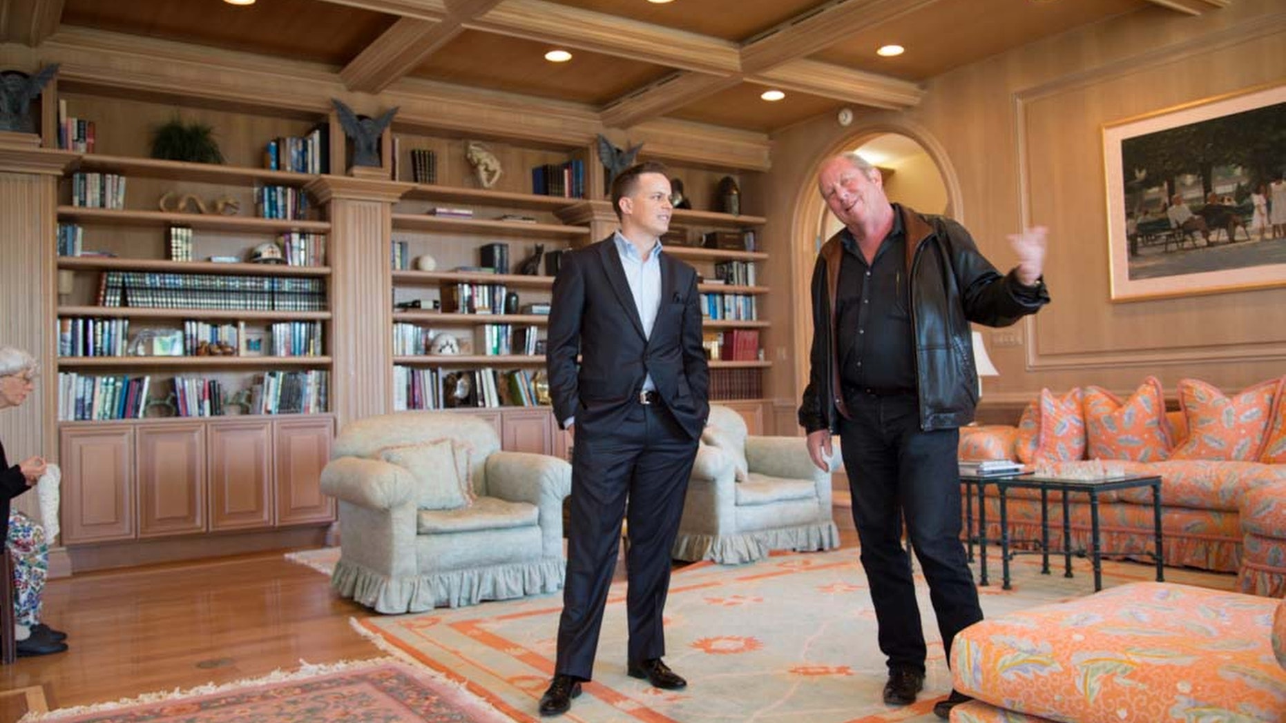 Dec. 12, 2013: In this photo, Jack Sommer, right, and his real estate agent Craig Tann stand in the library of Sommers'; home in the Spanish Trail neighborhood of Las Vegas.