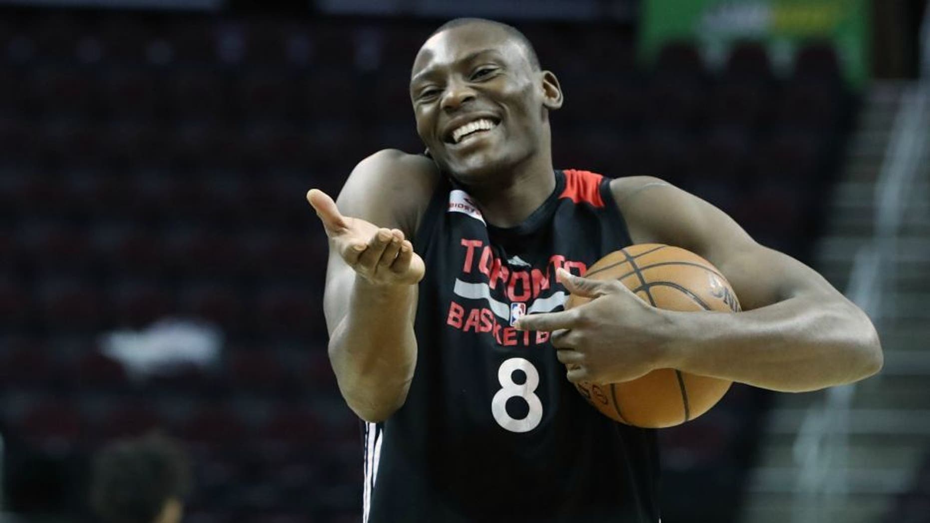 CLEVELAND, OH- MAY 25: Bismack Biyombo laughs after experimenting with an underhanded throw as the Toronto Raptors prepare to play the Cleveland Cavaliers in game 5 of the NBA Conference Finals at Quicken Loans Arena in Cleveland. May 25, 2016. (Steve Russell/Toronto Star via Getty Images)