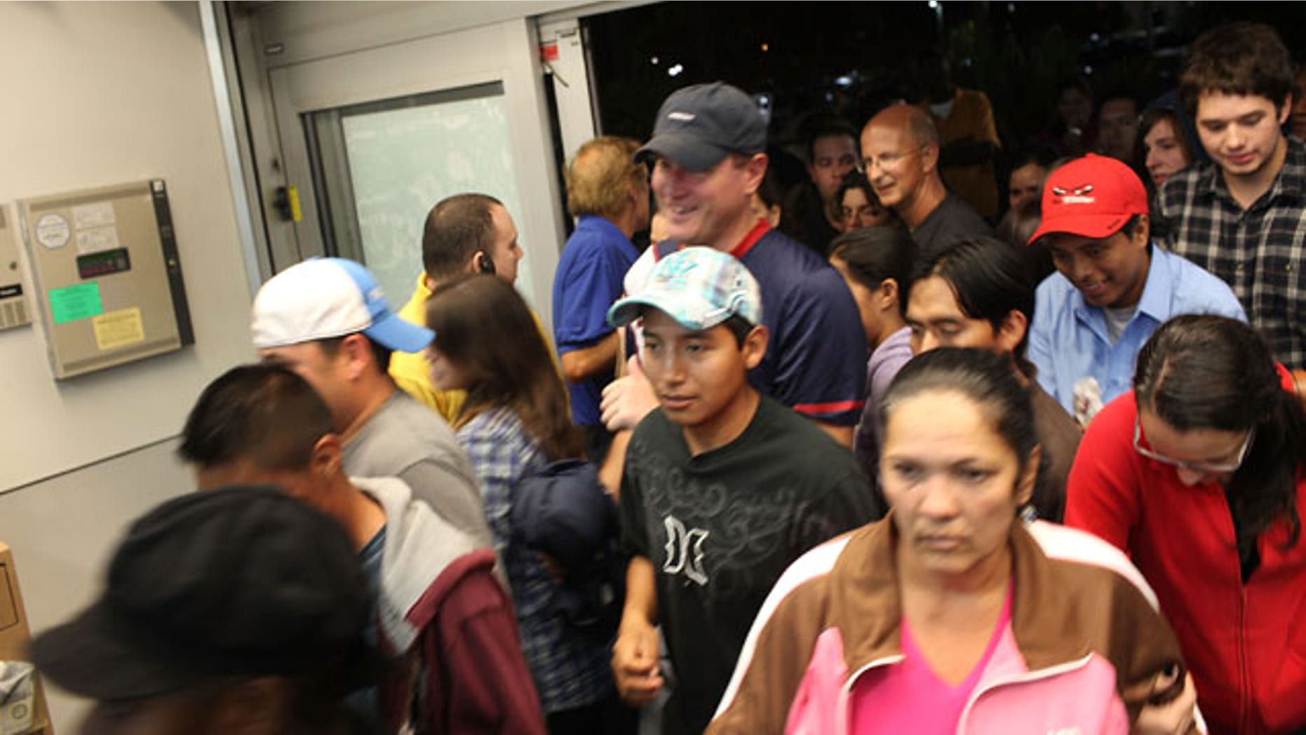 NAPLES, FL - NOVEMBER 26: Shoppers crowd a Best Buy store at dawn during Black Friday, the day after Thanksgiving which commences the holiday gift-buying season on November 26, 2010 in Naples, Florida. That scene is expected to play out all at shopping centers across the country on November 25, 2011. (Photo by Spencer Platt/Getty Images)
