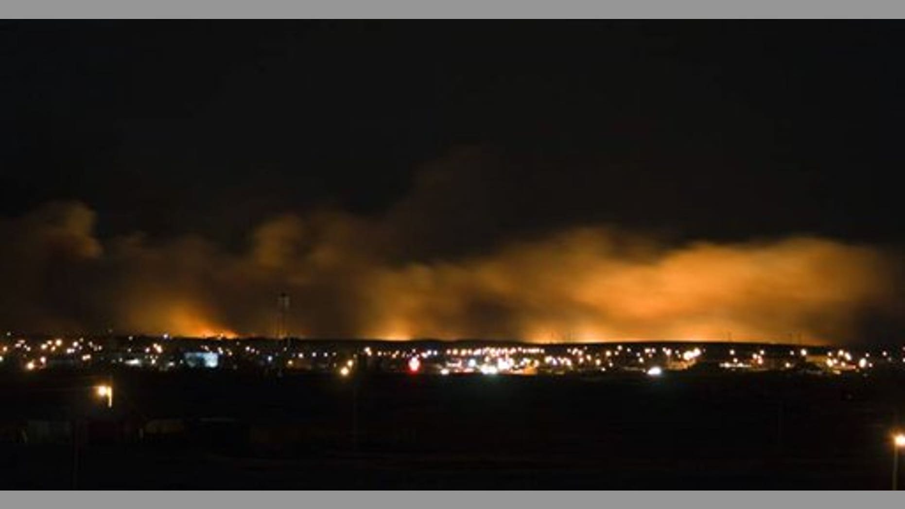Jan.4: Smoke and fire rise over Browning, Mt.