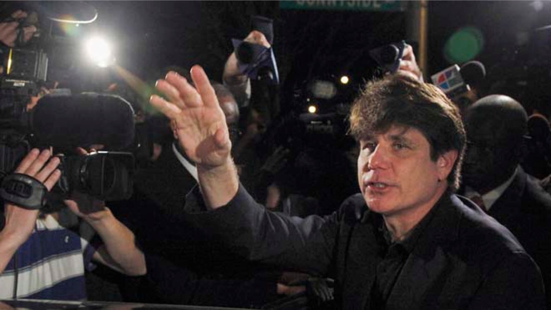 March 15, 2012: Former Illinois Gov. Rod Blagojevich departs his Chicago home for Littleton, Colo., to begin his 14-year prison sentence on corruption charges.