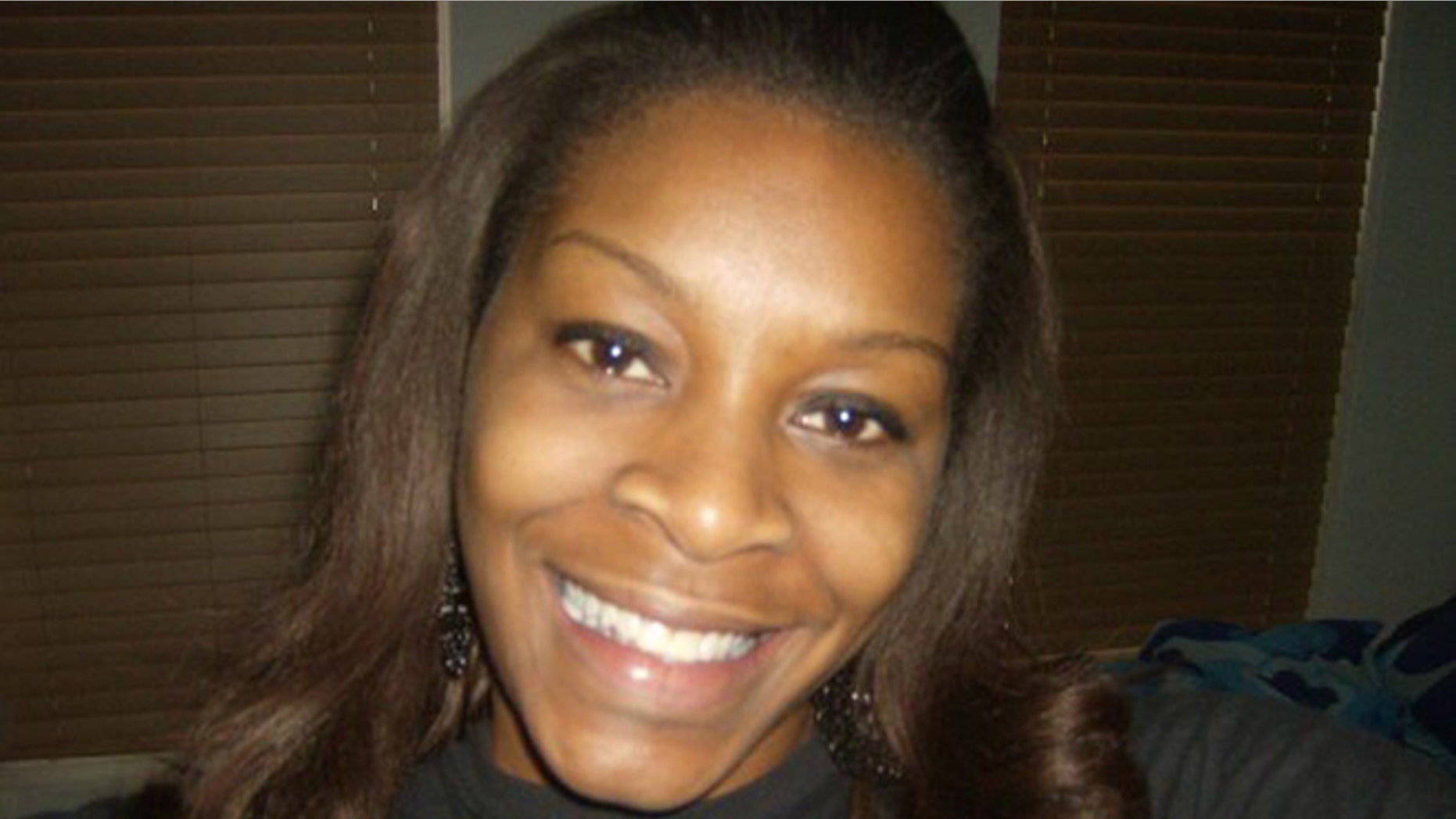 FILE - In this undated photo provided by the Bland family, Sandra Bland poses for a photo. A grand jury indicted Trooper Brian Encinia on Wednesday, Jan. 6, 2016, with the misdemeanor charge. Encinia has been on desk duty since Bland was found dead in her cell in July. Her death was ruled a suicide. (Courtesy of Bland family via AP, File)