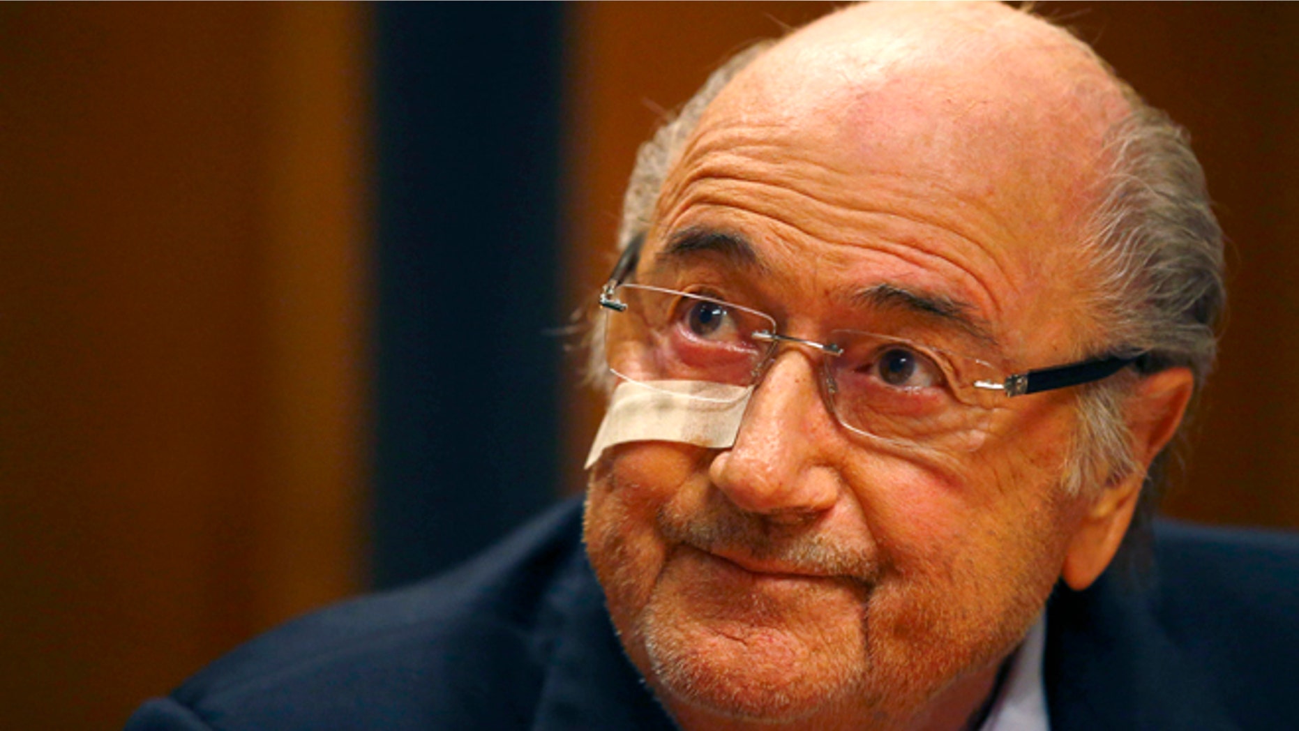 Suspended FIFA President Sepp Blatter attends a news conference in Zurich, Switzerland, Monday, Dec. 21, 2015 after he has been banned for 8 years from all football related activities. (AP Photo/Matthias Schrader)