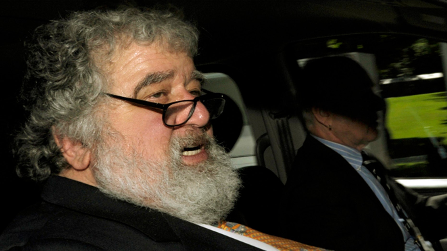 FILE - In this May 29, 2011 file photo FIFA official Chuck Blazer leaves the FIFA headquarters in Zurich, Switzerland. As it was announced Thursday, July 9, 2015 FIFA's ethics committee has expelled former executive committee member Blazer from football for bribery and other corruption. (Steffen Schmidt/Keystone via AP, File)