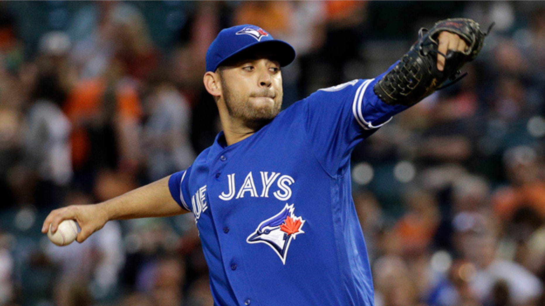 FILE- In this April 21, 2016, file photo, Toronto Blue Jays starting pitcher Marco Estrada throws to the Baltimore Orioles during the first inning of a baseball game in Baltimore. Estrada has gone on the disabled list because of a sore lower back and will not play in the All-Star Game. "My worst nightmare came true, unfortunately," Estrada said Wednesday, July 6. "In the long run, this is the right thing to do." (AP Photo/Patrick Semansky, File)