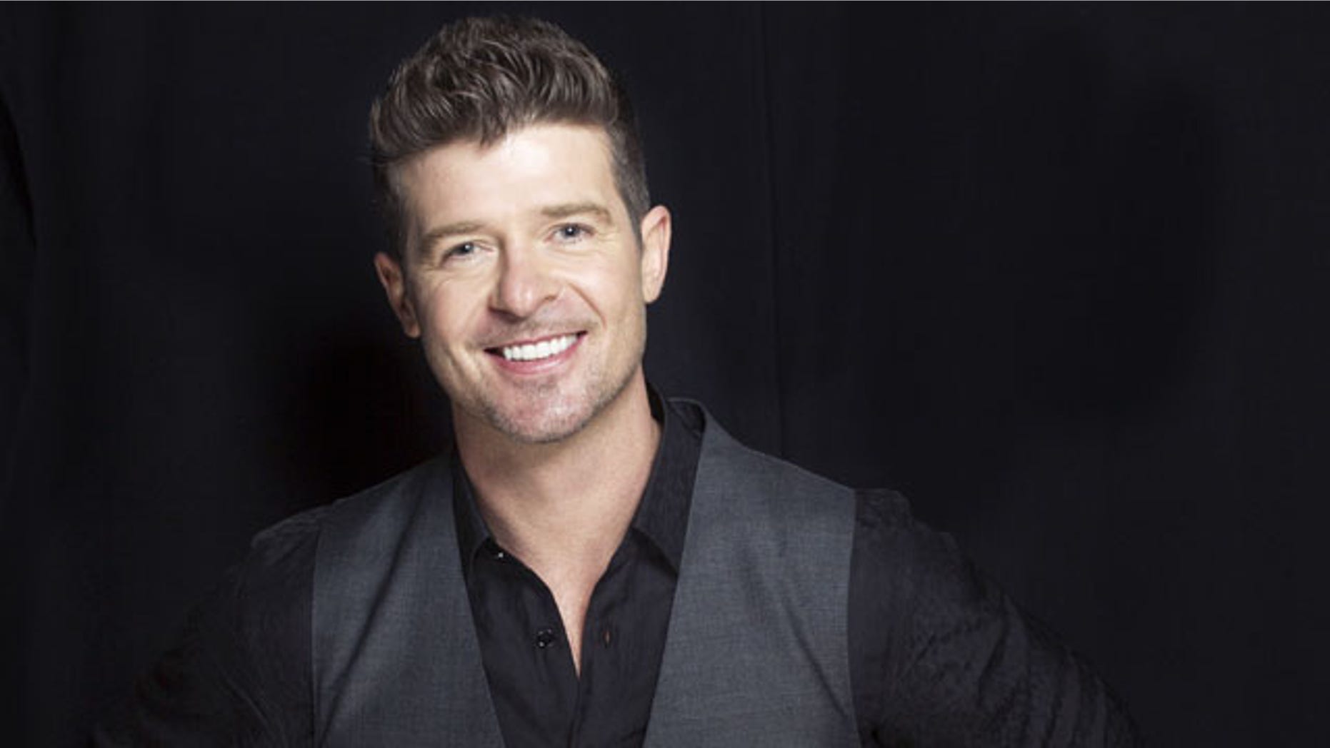 FILE - This Aug. 1, 2013 file photo shows R&B singer-songwriter Robin Thicke in New York. Two of Marvin Gaye's children, Nona and Frankie Gaye, countersued Thicke and his collaborators on the hit song "Blurred Lines" on Wednesday in Los Angeles claiming the singers improperly copied their father's hit "Got to Give It Up." (Photo by Victoria Will/Invision/AP, File)