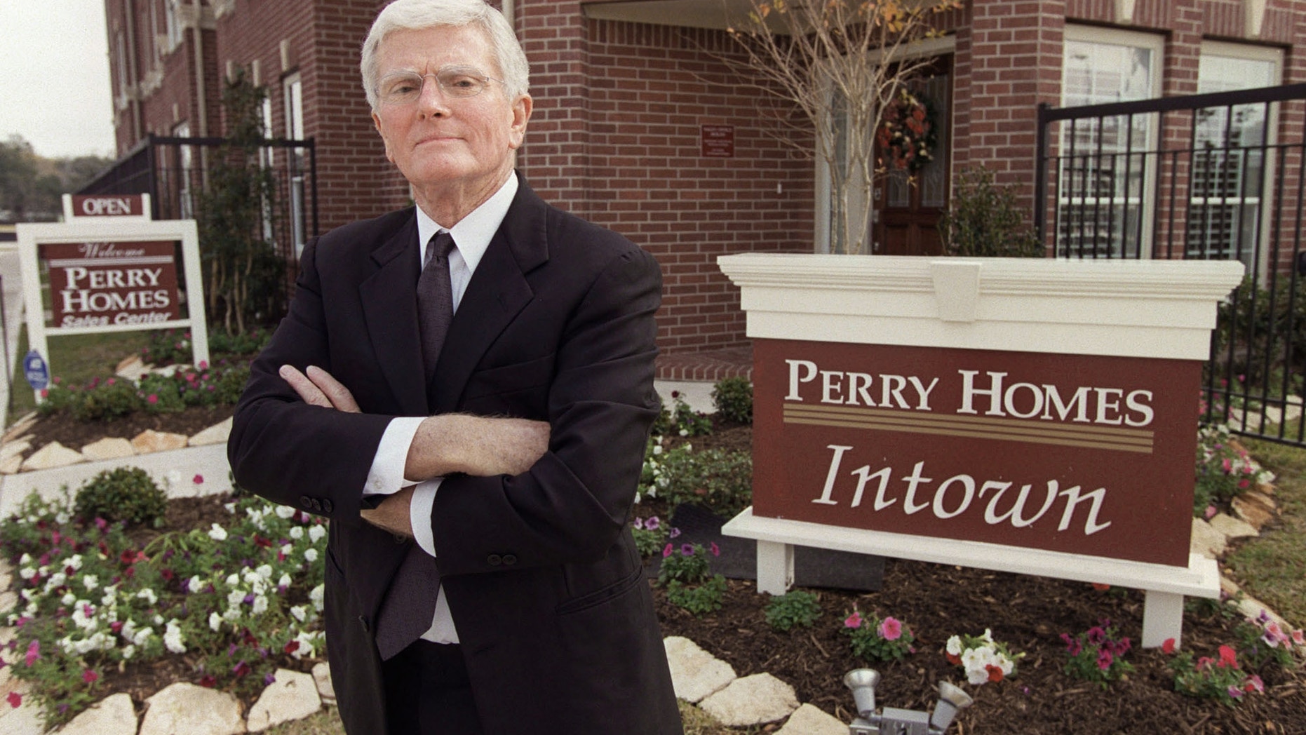 This is a Dec. 10, 2002 file photo of Houston homebuilder Bob Perry, posing at the sales center at one of his Houston developments.