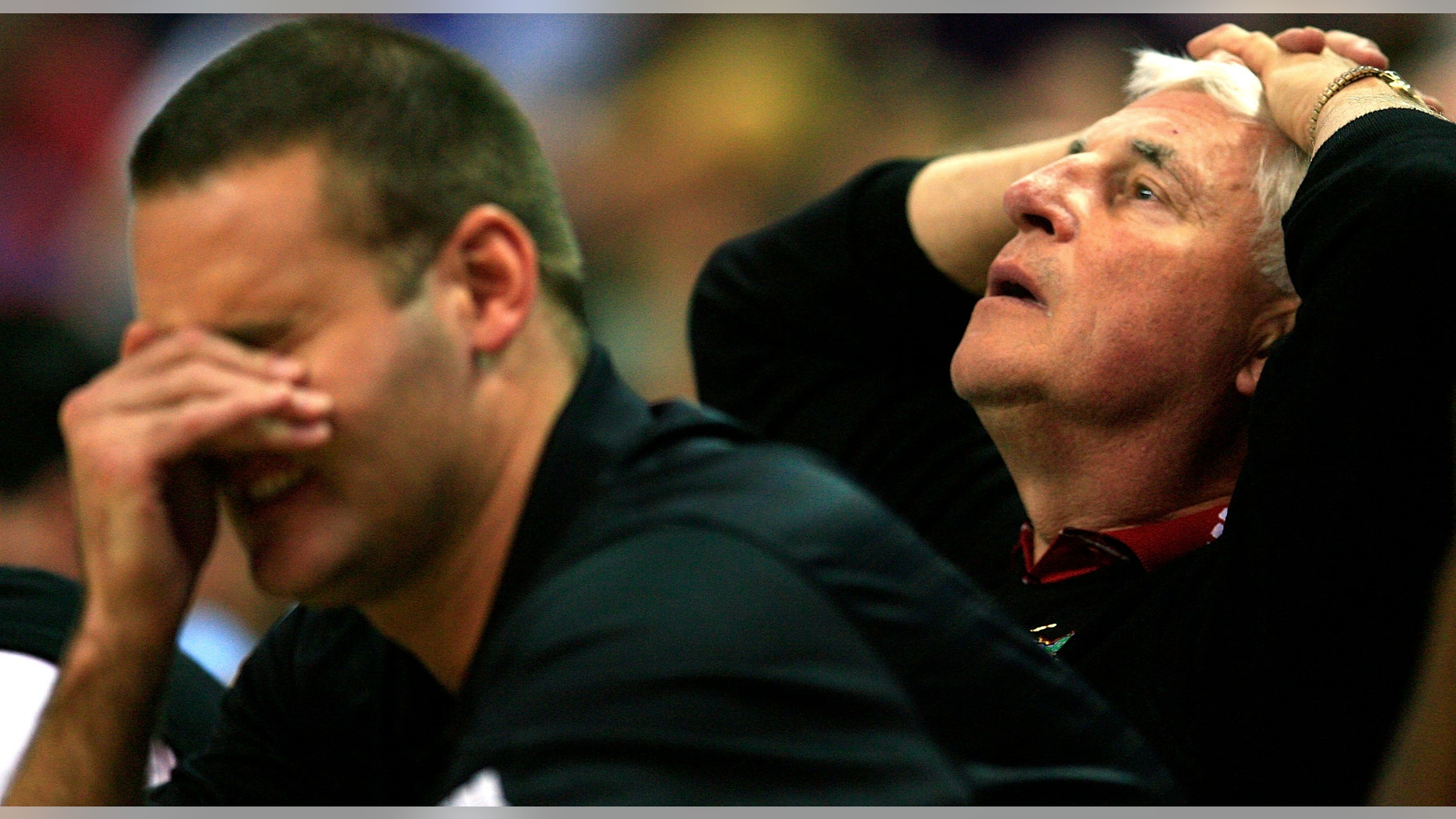OKLAHOMA CITY - MARCH 09: Head coach Bob Knight of the Texas Tech Red Raiders and head coach designee and son, Pat Knight, react after a missed basket during the quarterfinal game of the Phillips 66 Big 12 Men's Basketball Championship against the Kansas State Wildcats on March 9, 2007 at the Ford Center in Oklahoma City, Oklahoma. (Photo by Jamie Squire/Getty Images)