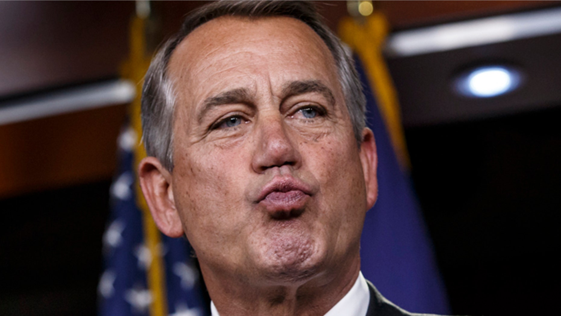 Feb. 26, 2015: House Speaker John Boehner responds to reporters about the impasse over passing the Homeland Security budget because of Republican efforts to block President Obama's executive actions on immigration.