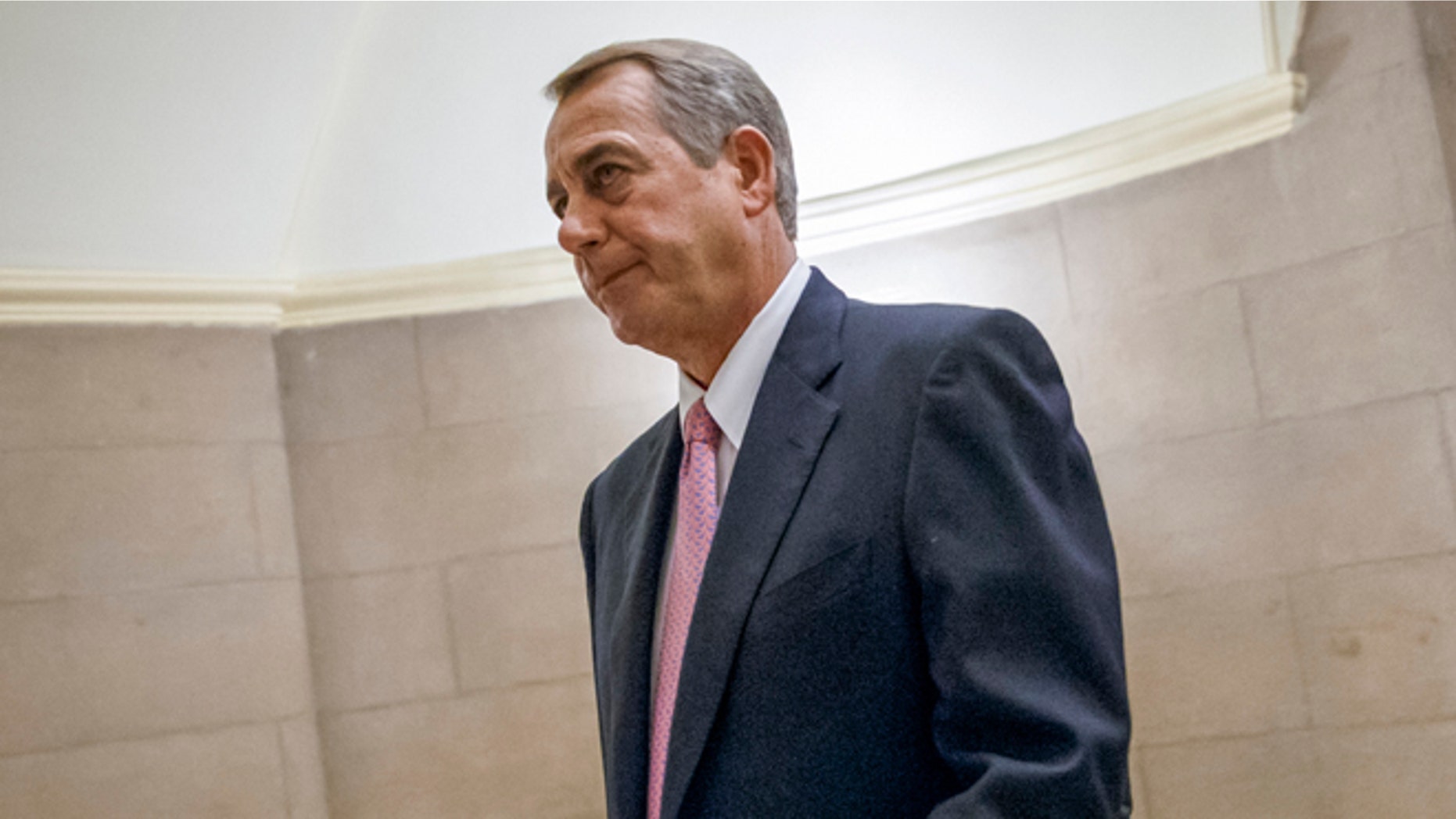 House Speaker John Boehner of Ohio walks to the House chamber on Capitol Hill in Washington, Tuesday, March 3, 2015. Boehnerâs job is safe despite passing yet another big bill that most of his Republican colleagues oppose, as he did Tuesday to avert defunding the Department of Homeland Security. But Boehner and his leadership team appear destined to confront fratricidal fights for months to come. The friction exposes deep GOP ideological differences as the 2016 presidential campaign gets under way. (AP Photo/J. Scott Applewhite)