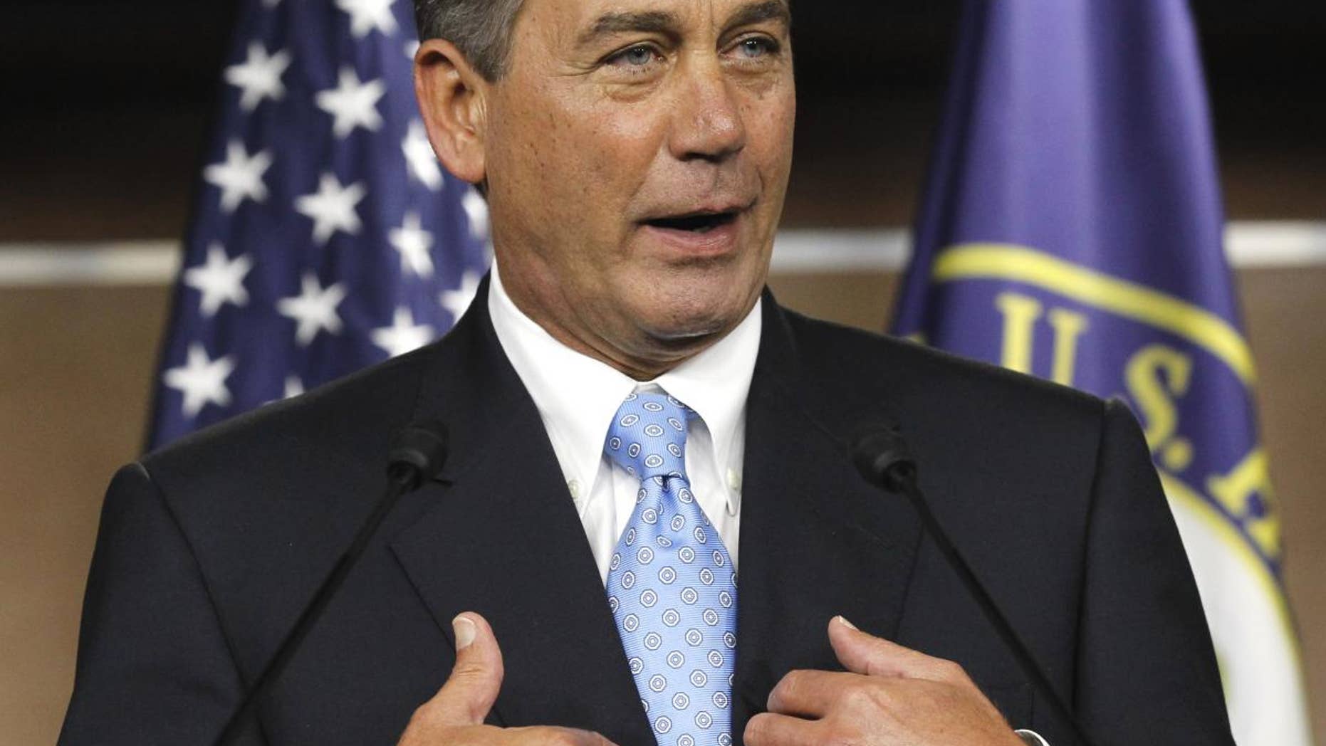 House Speaker John Boehner of Ohio gestures during a news conference on Capitol Hill in Washington, Wednesday, March 2, 2011. (AP Photo/Alex Brandon)