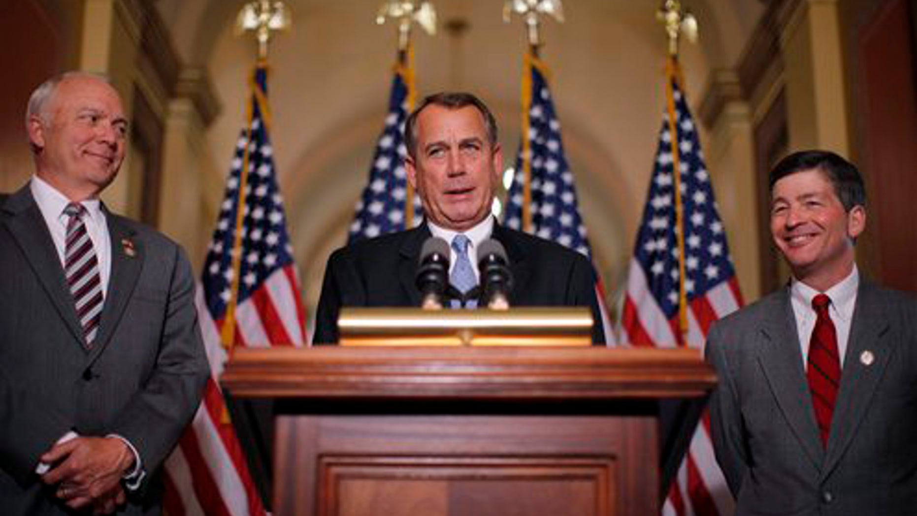 House Speaker John Boehner of Ohio, accompanied by House Education and the Workforce Committee Chairman Rep. John Kline, R-Minn., left, and Rep. Jeb Hensarling, R-Texas, speak about a student loans bill, Wednesday, April 25, 2012, on Capitol Hill in Washington. (AP Photo/Charles Dharapak)