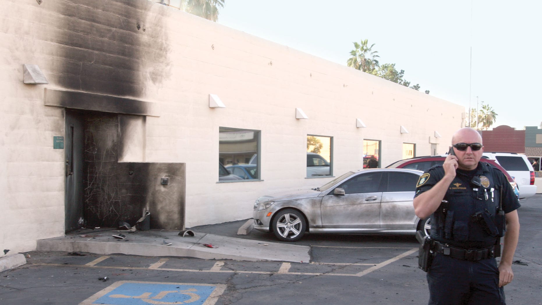 Nov. 30, 2012: Police investigate an apparent bomb explosion at the Social Security Administration office on Marshall Street in downtown Casa Grande, Ariz.