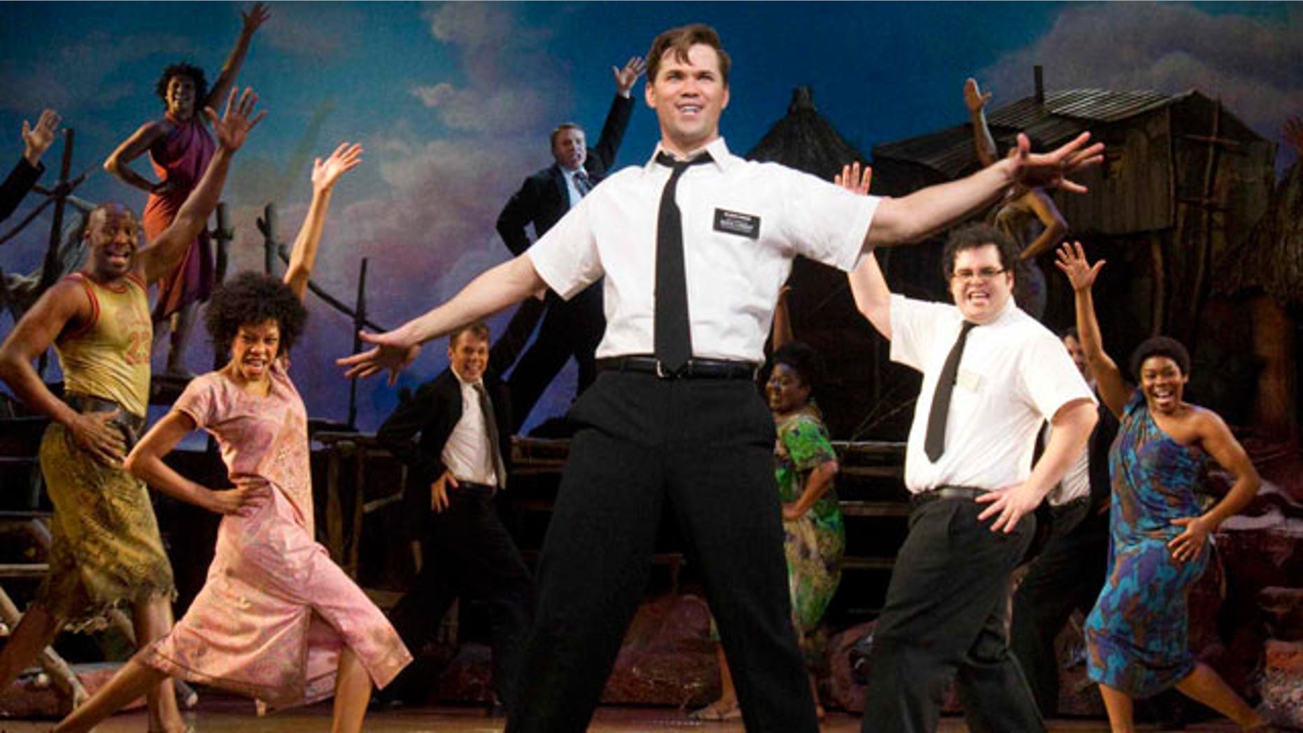 n this theater publicity image released by Boneau/Bryan-Brown, Andrew Rannells, center, performs with an ensemble cast in "The Book of Mormon" at the Eugene O'Neill Theatre in New York. (AP)