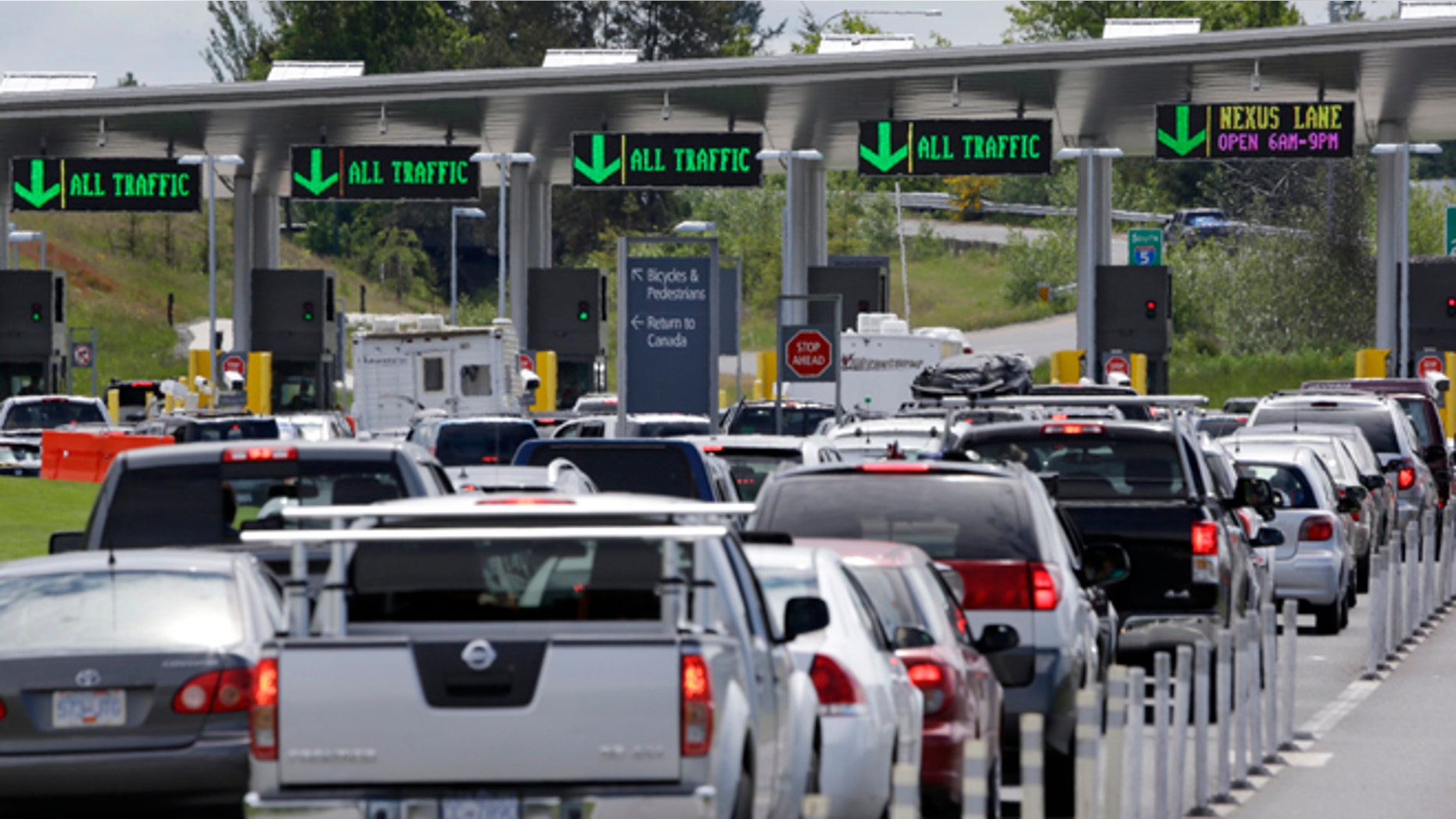 May 23, 2013: Cars from Canada line up to cross into the U.S. in Blaine, Wash. In April 2013, in its 2014 fiscal year budget proposal, the Department of Homeland Security requested permission to study a fee at the nation's land border crossings. The request has sparked wide opposition among members of Congress from northern states, who vowed to stop it. A fee, they say, would hurt communities on the border that rely on people, goods and money moving between the U.S. and Canada.