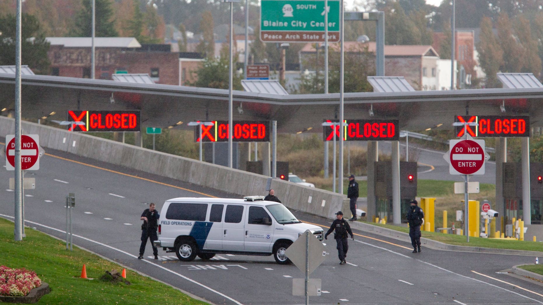 Oct. 16: 2012: United States border agents work at the closed Surrey, B.C./Blaine, Wash., border crossing.