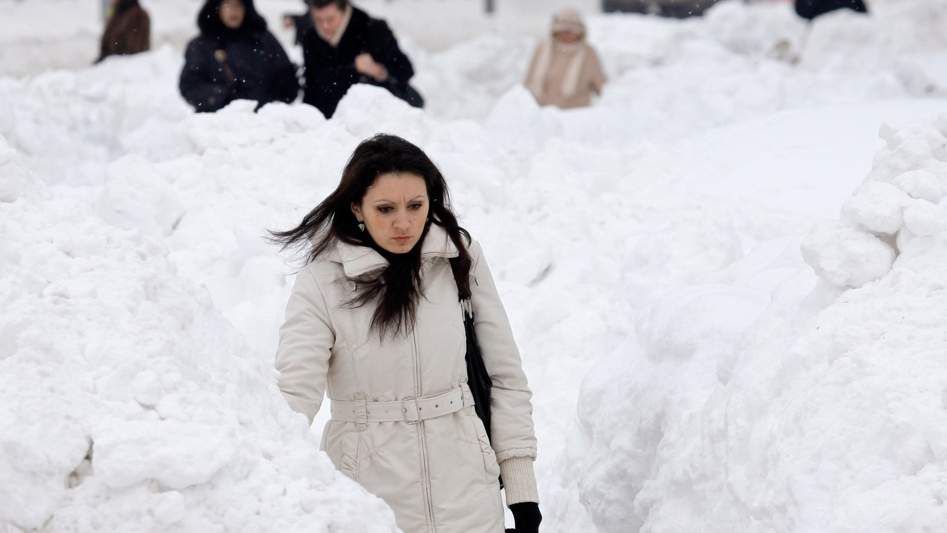 Feb. 6, 2012: A woman makes her way through a snow covered street in Sarajevo.