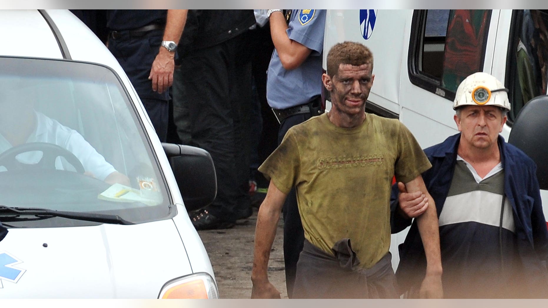 Sept. 5, 2014 - Coal miners help a fellow miner who was injured while trapped in the Raspotocje coal mine in Zenica, north of Sarajevo, Bosnia. Rescuers pulled out some of the 34 miners who had been trapped deep inside the collapsed coal mine, 1,600 feet below ground.