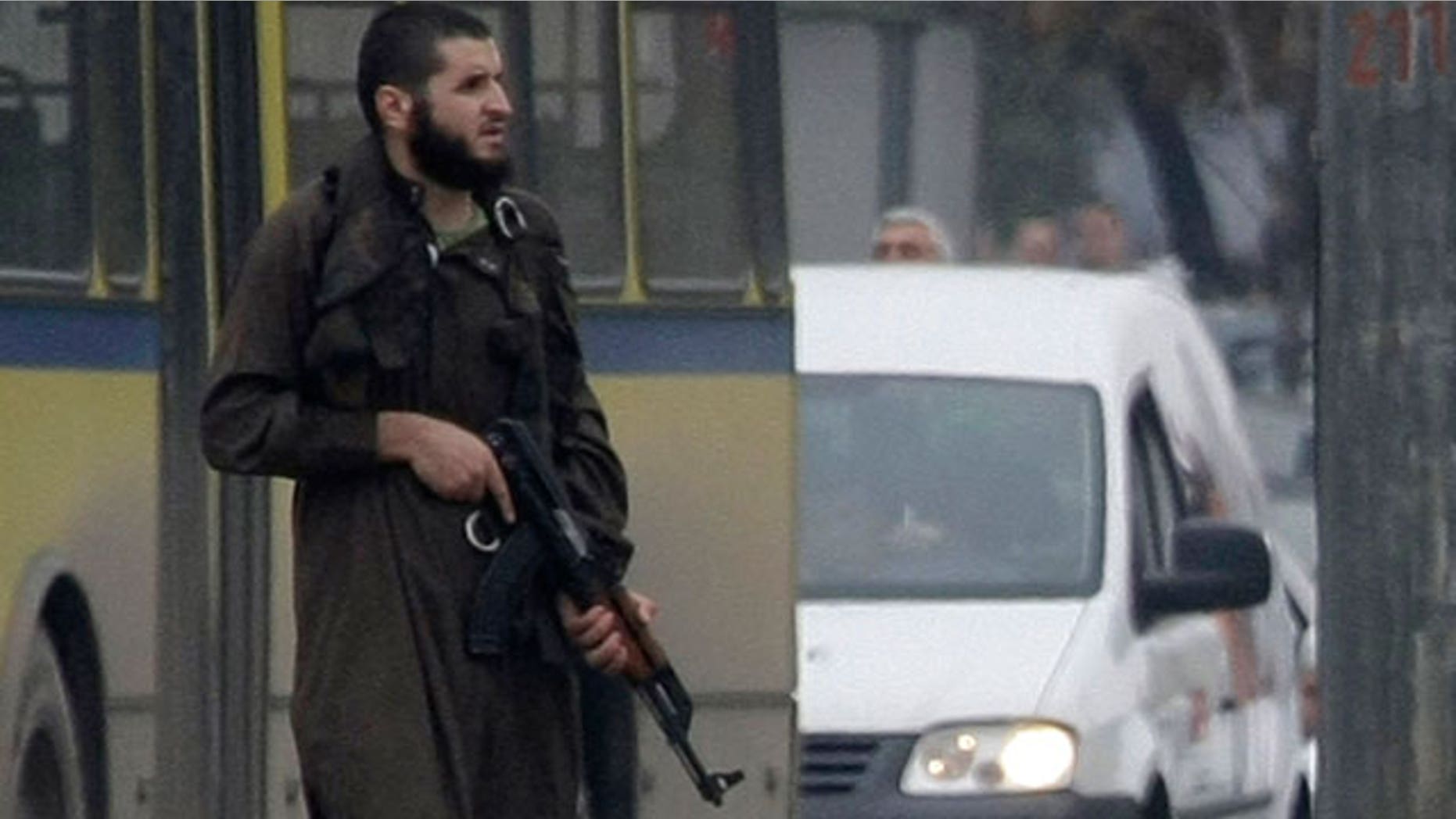 Oct. 28: 2011: An unidentified gunman stands in the center of the street in Sarajevo, Bosnia on a street in front of the U.S. embassy. An unidentified man shot several rounds at pedestrians in downtown Sarajevo on Friday and injured at least one officer before police special forces took him down.