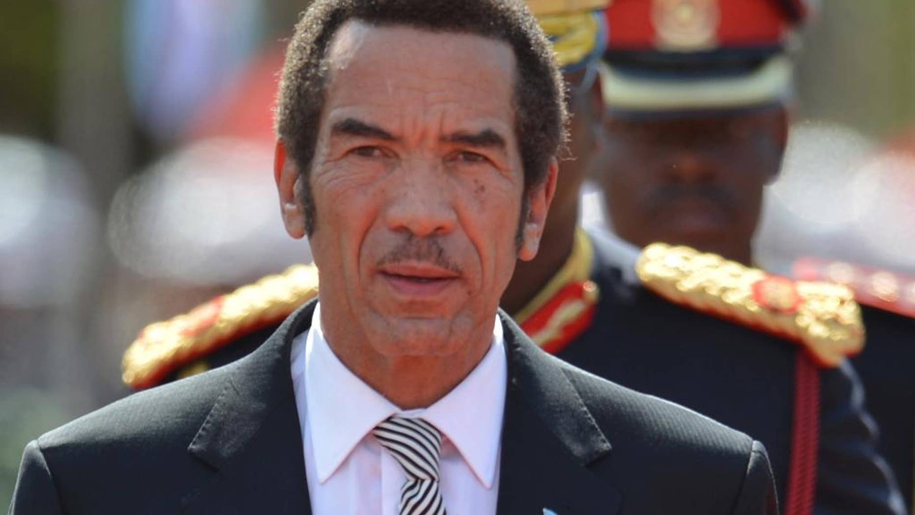 FILE - In this Tuesday, Oct. 28 2014, President of Botswana Ian Khama attends a swearing-in ceremony for a second and final term as Botswana president at the National Assembly buildings in Gaborone, Botswana. Opposition parties in Botswana say the president is undermining the role of parliament after he challenged the process of electing a vice president. (AP Photo)
