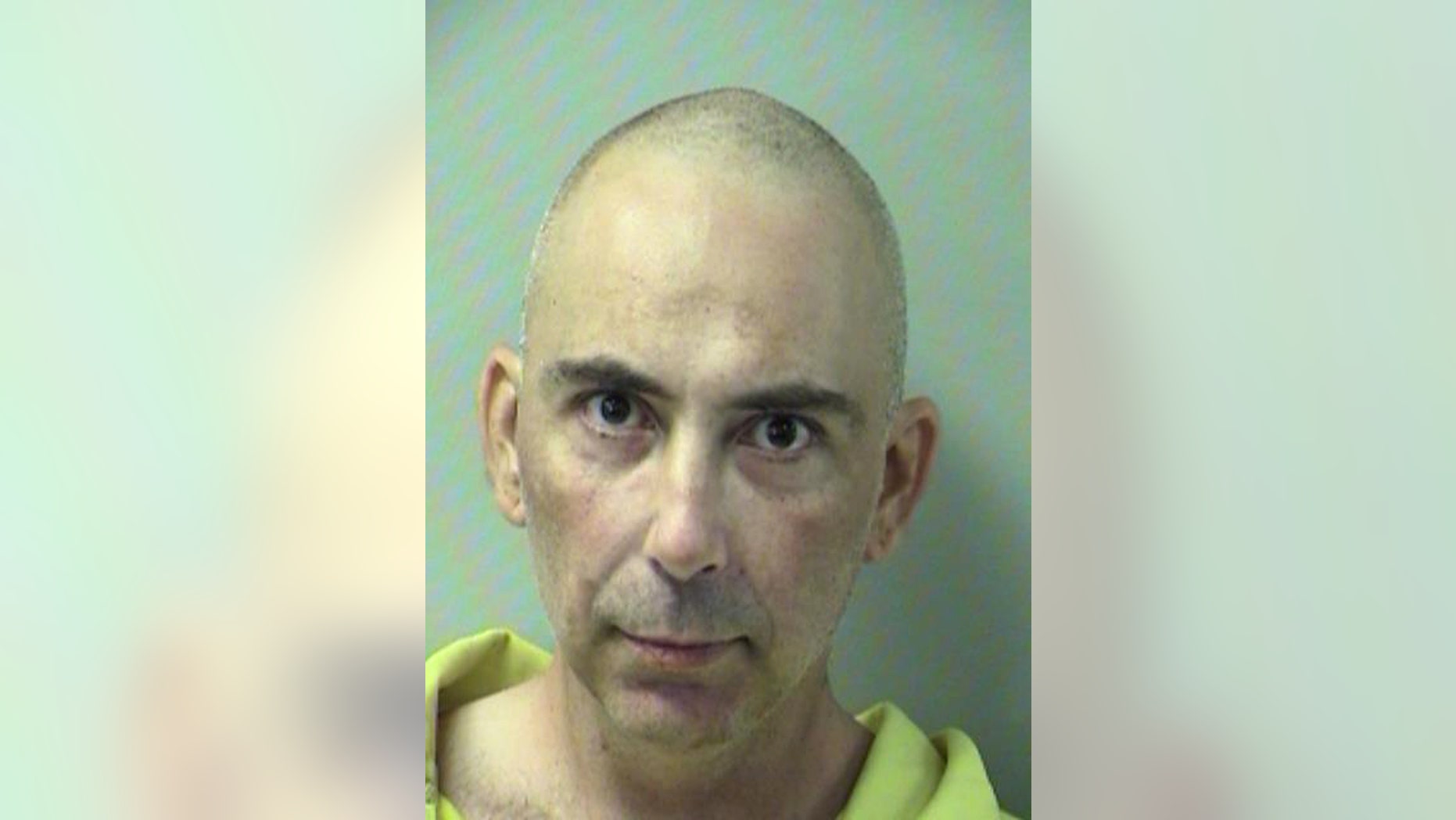Nov. 30, 2014: This photo provided by the Okaloosa County Department of Corrections shows Michael Watkins in a booking photo in Crestview, Fla. The Florida man was charged with murder after he told police he shot his mother with a gun and a bow-and-arrow then stabbed her.