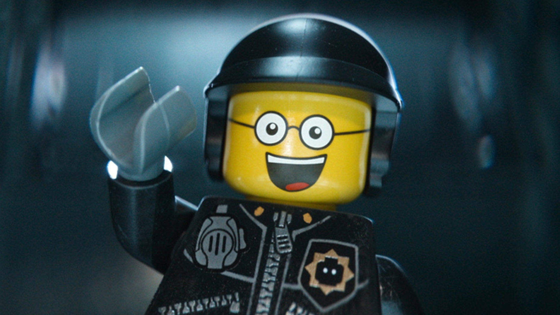 This image released by Warner Bros. Pictures shows the character Bad Cop/Good Cop, voiced by Liam Neeson, in a scene from "The Lego Movie." The Lego Movie is expected to take the top spot at the box office in its second weekend. (AP Photo/Warner Bros. Pictures, file)