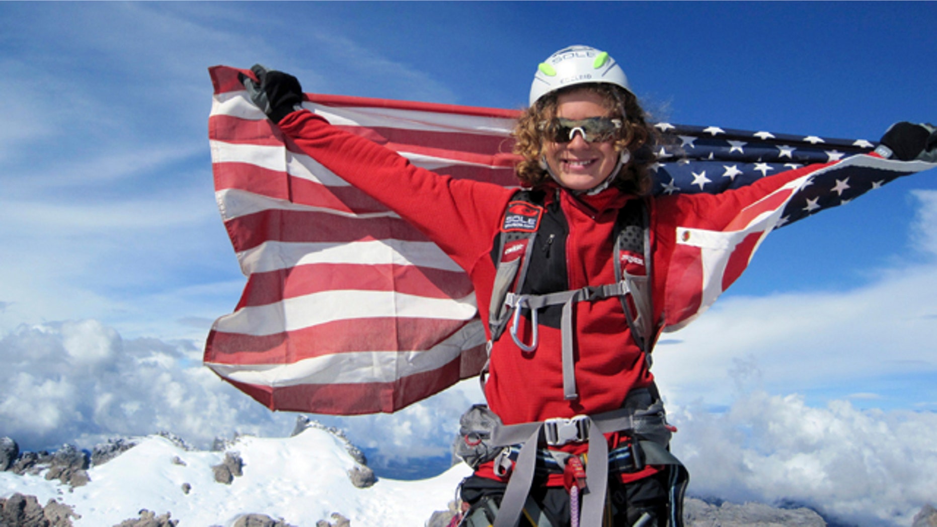 Jordan Romero of California, seen at the Carstensz Pyramid summit in this Sept. 1, 2009, file photo, has become the youngest climber to reach the top of Mount Everest. He is 13 and is one climb away from reaching the highest peaks on all seven continents.