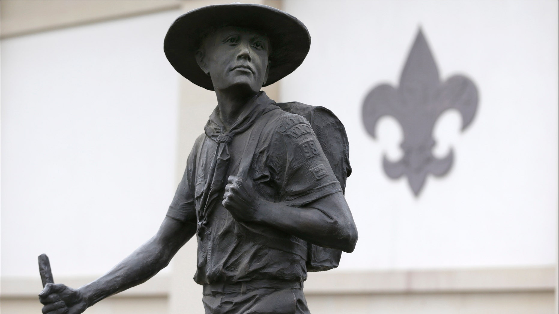 A statue of a Boy Scout stands in front of the National Scouting Museum, Monday, Jan. 28, 2013, in Irving, Texas. The Boy Scouts of America announced it is considering a dramatic retreat from its controversial policy of excluding gays as leaders and youth members. (AP Photo/LM Otero)