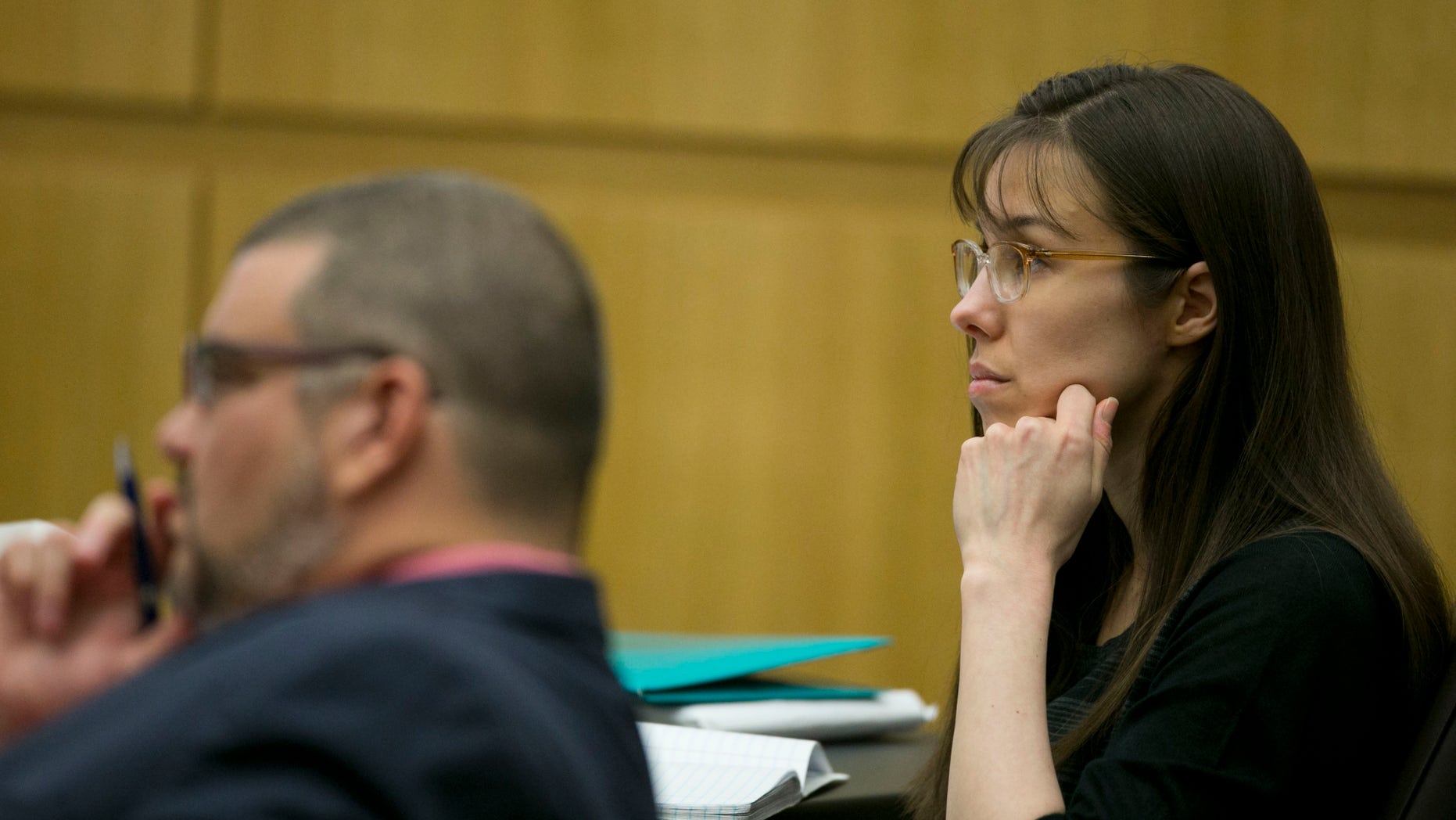 April 11, 2013: Defendant Jodi Arias listens during redirect of Alyce LaViolette, a domestic violence expert, during Arias's trial at Maricopa County Superior Court in Phoenix.