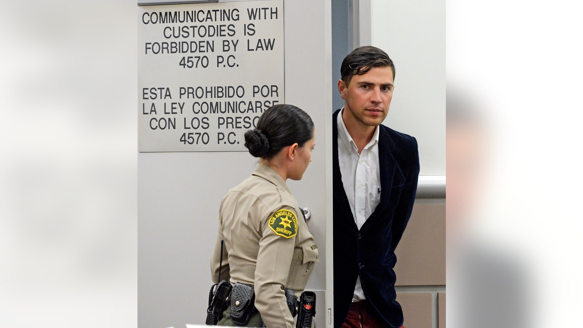 May 30, 2014. Vitalii Sediuk, from Ukraine, is led into the courtroom in Los Angeles Superior Court Friday, May 30, 2014, in Los Angeles. Sediuk faces four misdemeanor charges in connection with an alleged May 28 attack on actor Brad Pitt at a Los Angeles movie premiere.
