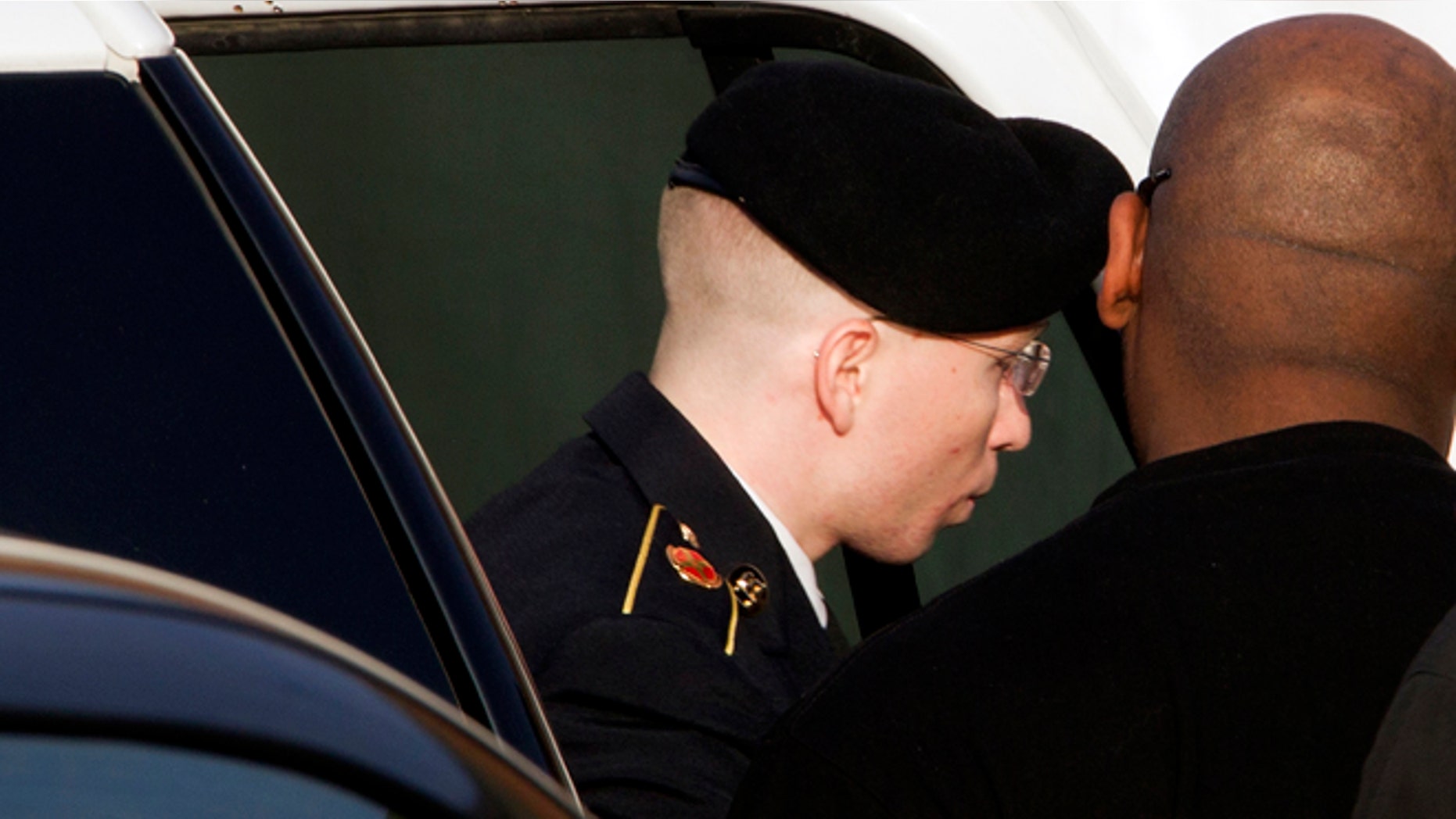 FILE Jan. 9, 2013: Army Pfc. Bradley Manning arrives to the courthouse for his motion hearing in Fort Meade in Maryland.