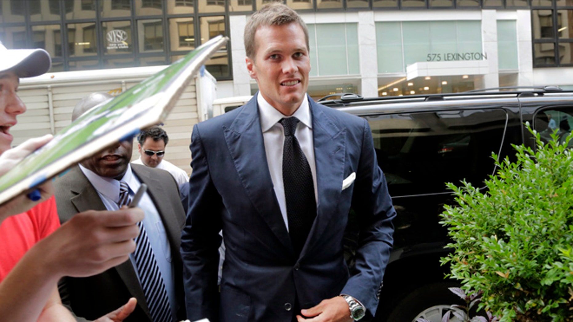 June 23: New England Patriots quarterback Tom Brady arrives for his appeal hearing at NFL headquarters in New York.
