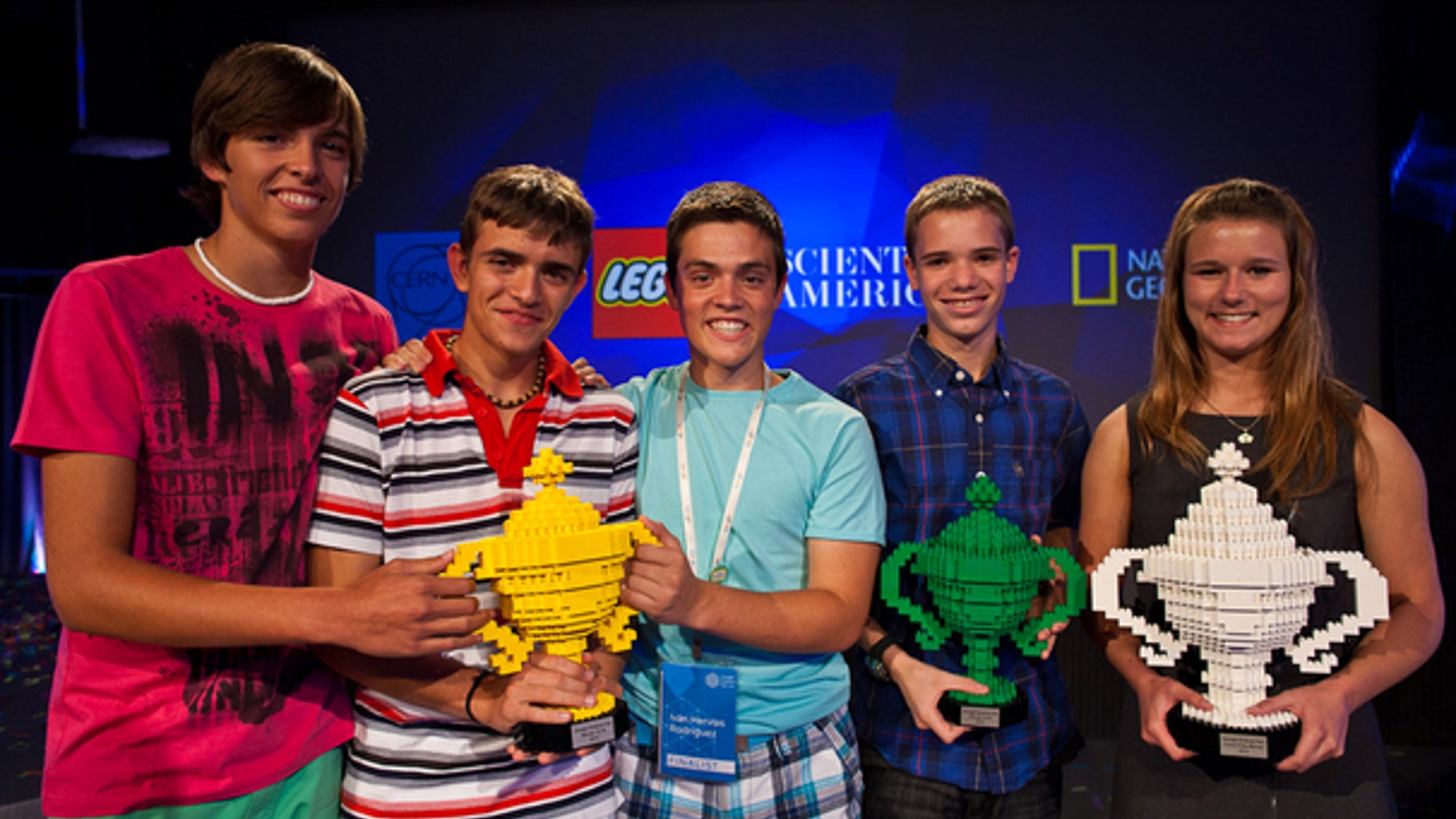 Google Science Fair grand prize winner Brittany Wenger (far right) shares the stage with other winners in their age categories