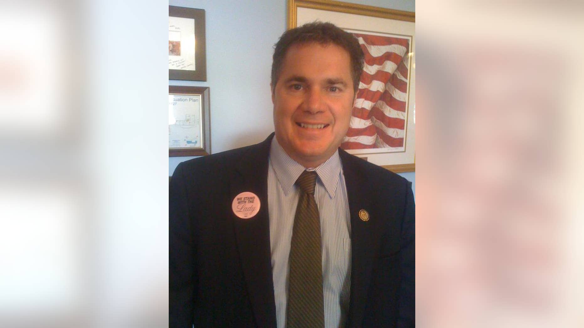 Rep. Bruce Braley, D-Iowa, wears one a button supporting Rep. Debbie Wasserman Schultz in this photo posted to his Twitter account. (Rep. Burce Braley Photo)