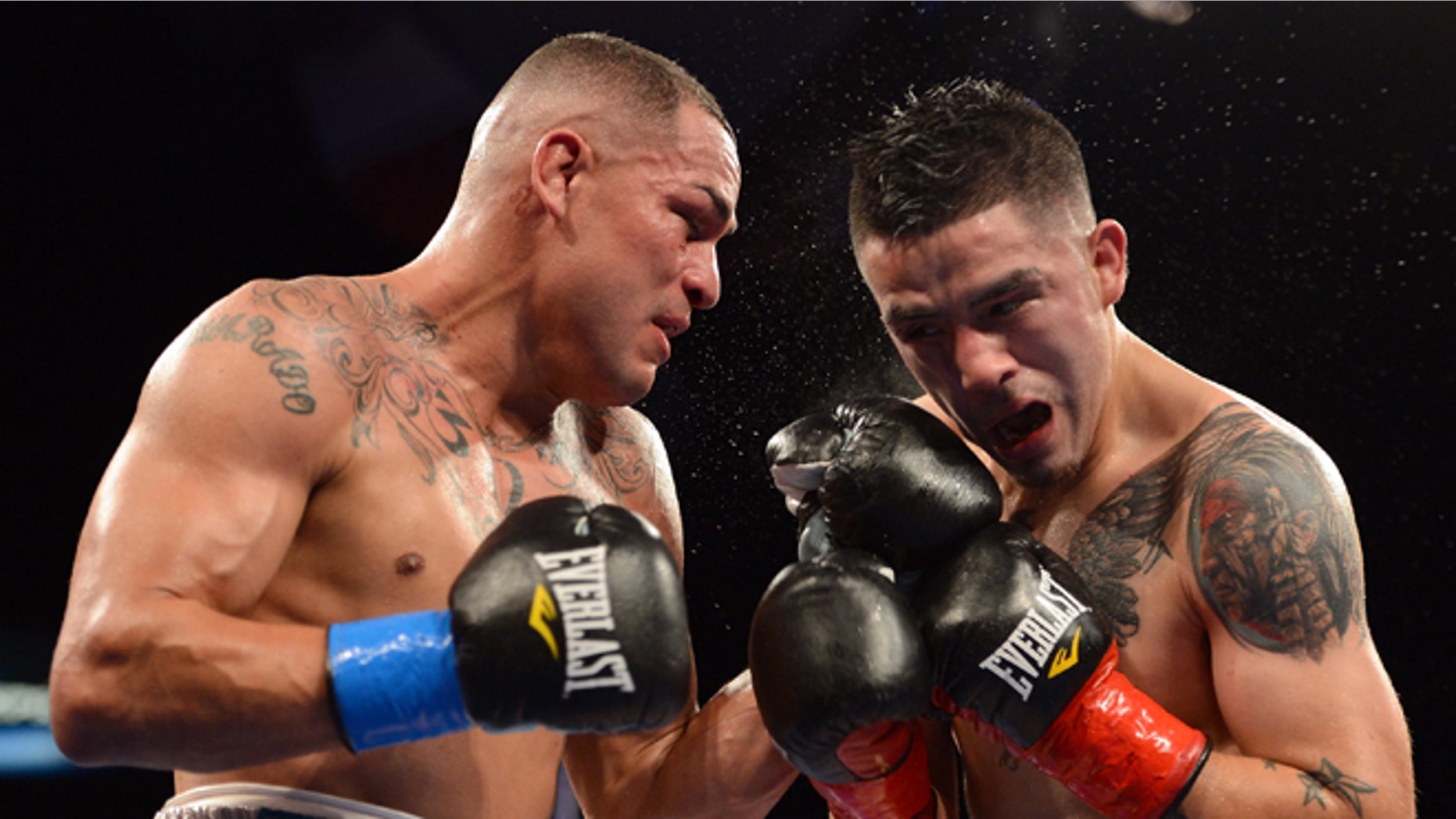 CARSON, CA - OCTOBER 13: Mike Alvarado punches Brandon Rios during the WBO Latino Super Lightweight Title fight at The Home Depot Center on October 13, 2012 in Carson, California. Rios would win with a seventh round TKO. (Photo by Harry How/Getty Images)