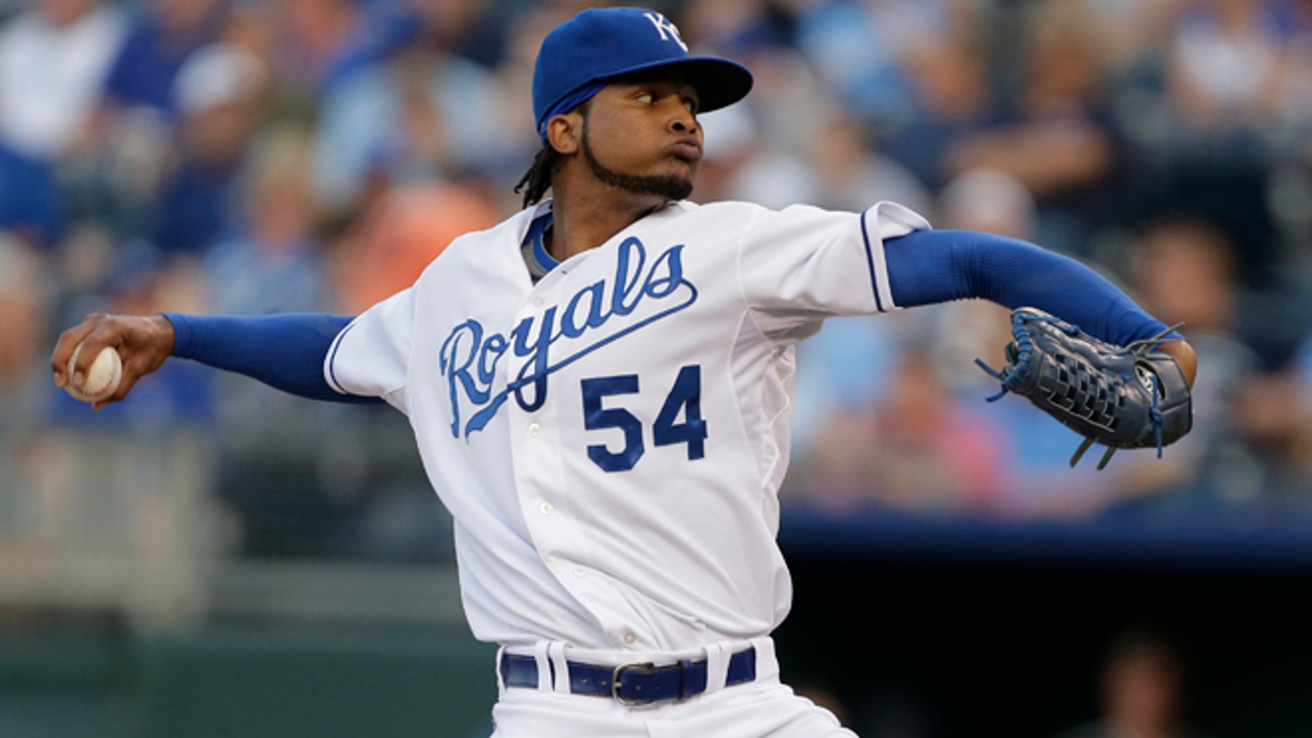 FILE - In this Aug. 20, 2013 file photo, Kansas City Royals starting pitcher Ervin Santana throws during the first inning of a baseball game against the Chicago White Sox, in Kansas City, Mo. The Atlanta Braves have signed Santana to bolster their injury plagued starting rotation. The team announced Wednesday, March 12, 2014, that Santana agreed to a one-year deal. (AP Photo/Charlie Riedel, File)