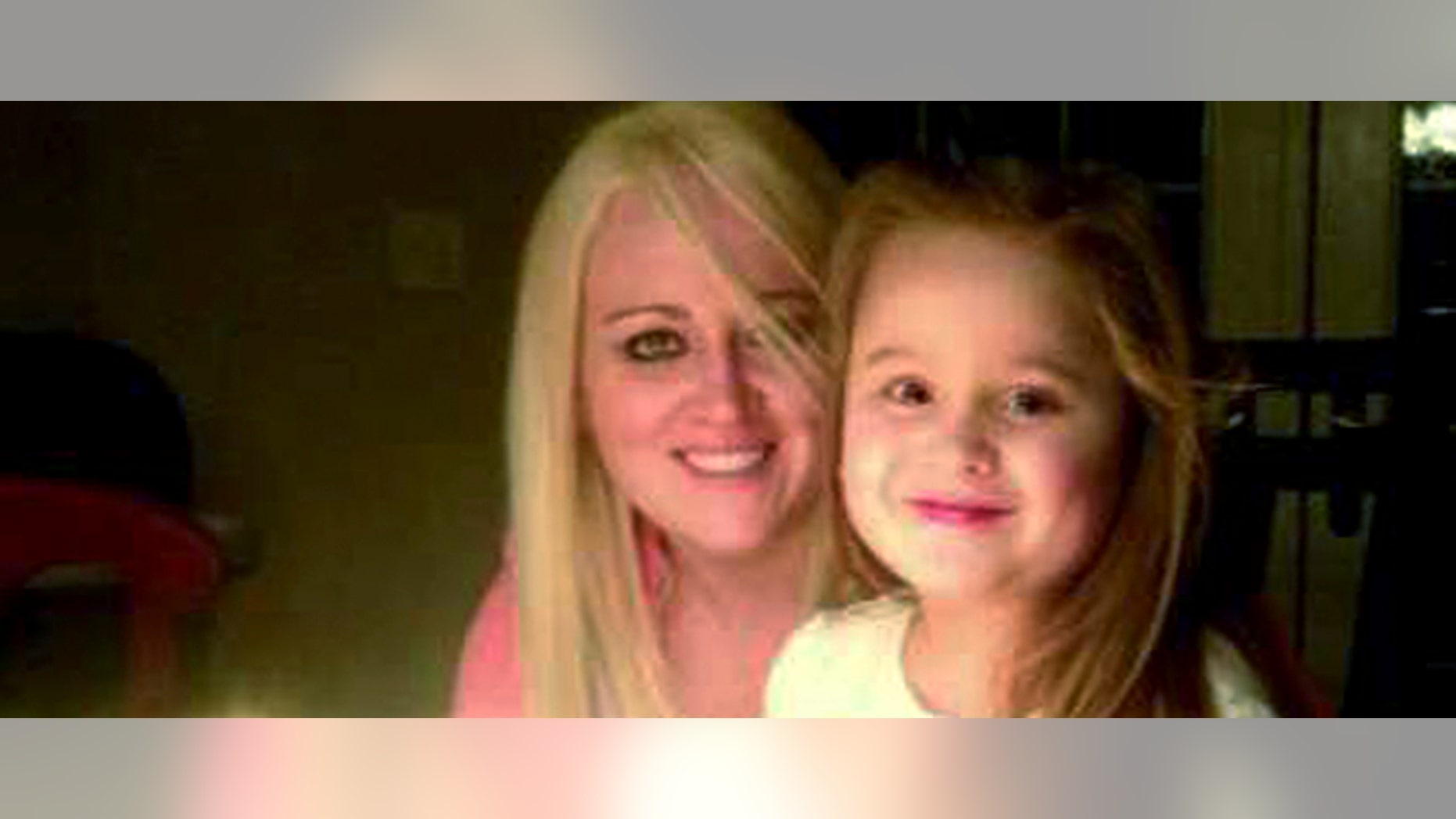 This March 2013 family photo provided by Lindsey DeFilipi shows Shauna Hadden, left, and her daughter Ava Machado, both of Agawam, Mass. Hadden, a Massachusetts mom says she and her 6-year-old daughter are stranded in Brazil after police seized their passports because of a custody battle with the childâs father. (AP Photo/Family Photo)