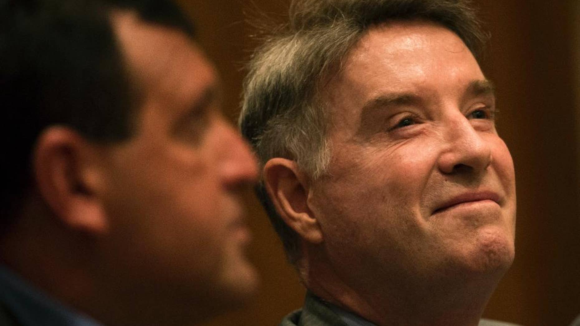 FILE - In this Nov. 18, 2014 file photo, former billionaire Eike Batista, a Brazilian tycoon once named No. 7 on Forbes' list of the world's richest people, attends his hearing at a federal criminal court in Rio de Janeiro, Brazil. On Tuesday, April 28, 2015, a Rio de Janeiro judge has ordered the return of Batista's seized property, who’s now fighting inside trading and other charges. (AP Photo/Felipe Dana, File)