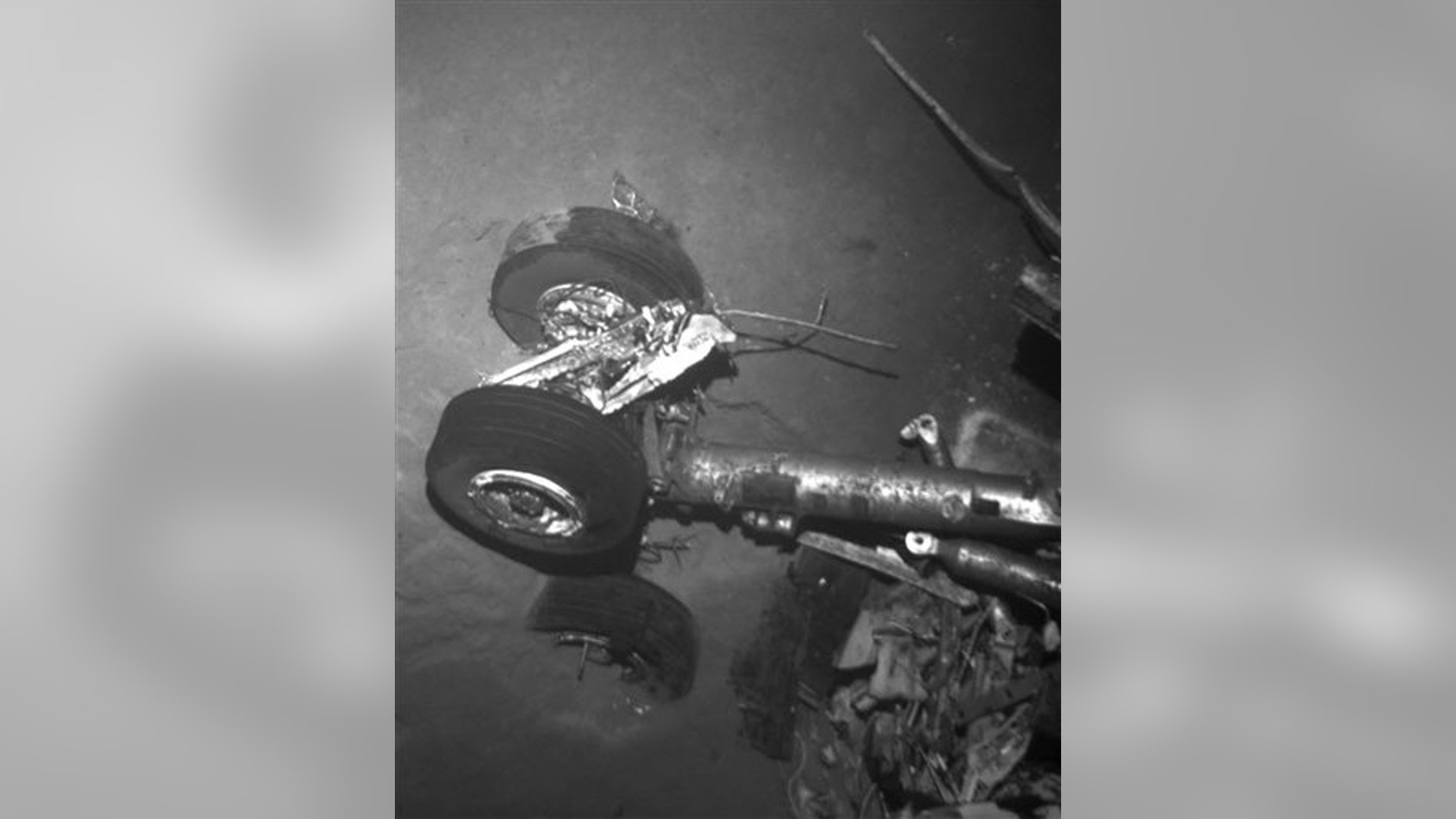 This undated black and white photo provided Monday April 4, 2011 by France's air accident investigation agency, the BEA, shows a landing gear of flight AF447, which crashed off Brazil.